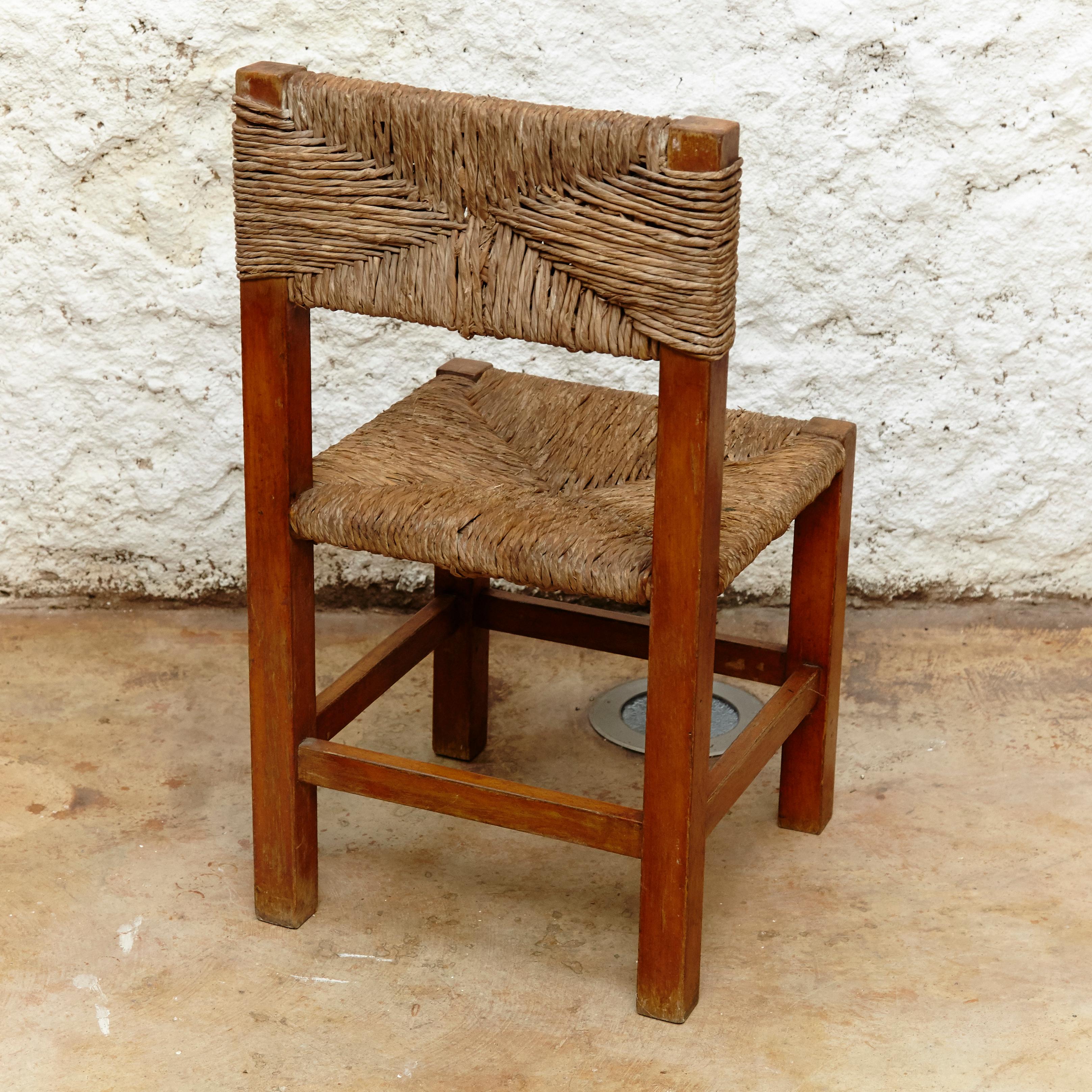 Set of Four Chairs after Charlotte Perriand in Wood and Rattan, circa 1950 11