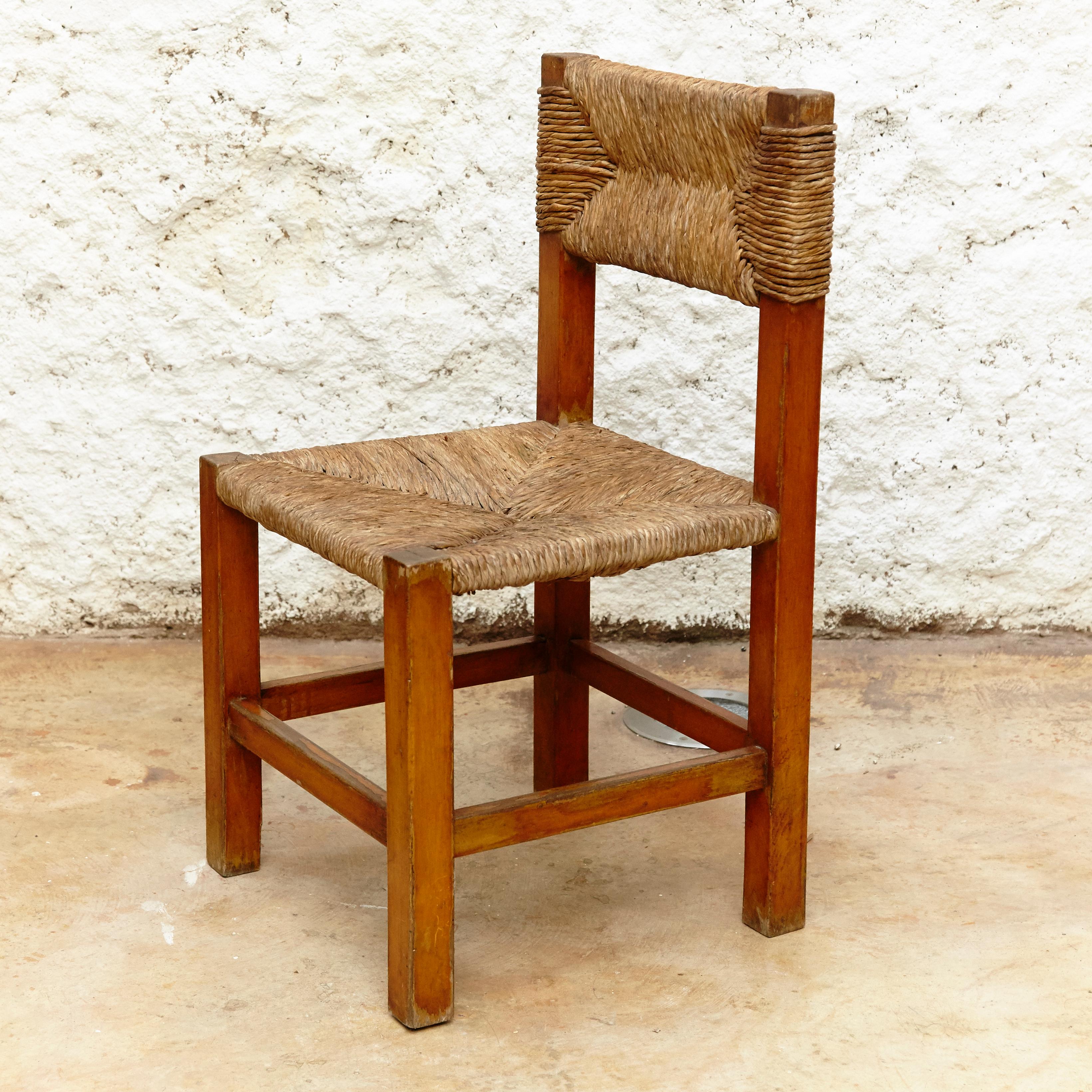 Set of Four Chairs after Charlotte Perriand in Wood and Rattan, circa 1950 3