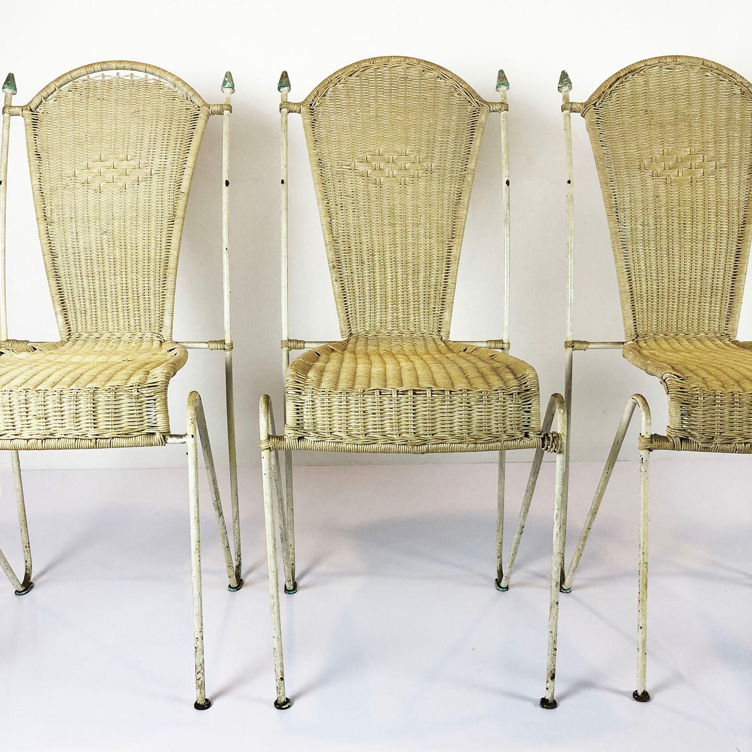 Rare set of four original chairs attributed to Arturo Pani in iron and original rattan, circa 1950.