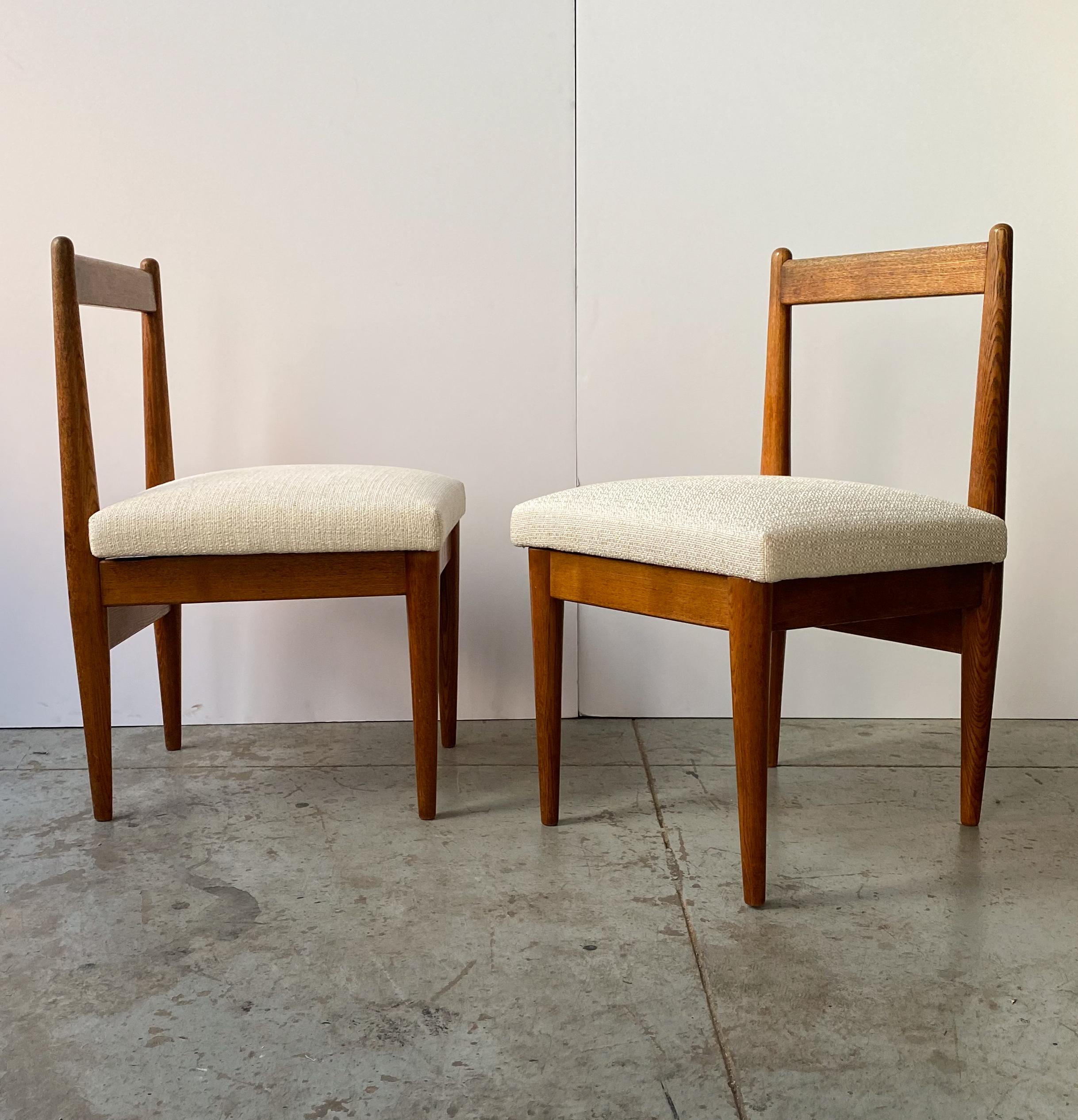 Set of four teak chairs with upholstered seats. A spare and elegant design by Japanese furniture designer Katsuo Matsumura (1923-1991), produced circa 1962 for his own residence in Yokohama (see in situ photograph below). After graduating from the
