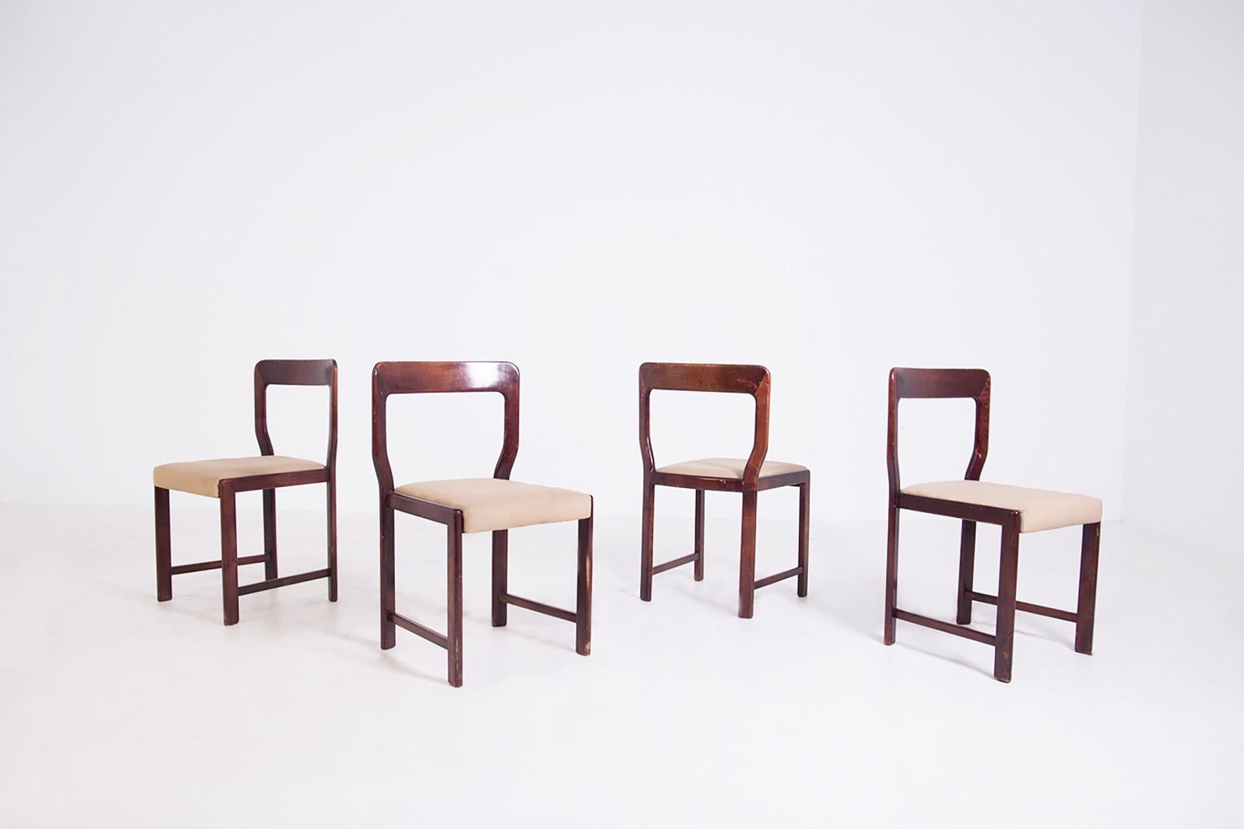 Beautiful set composed of four chairs by Mario Sabot from 1960.
Mario Sabot chair set is in its original condition. The frame is made of fine mahogany wood, and the back is slightly curved. The seat of chairs is made of fine cotton of the time in