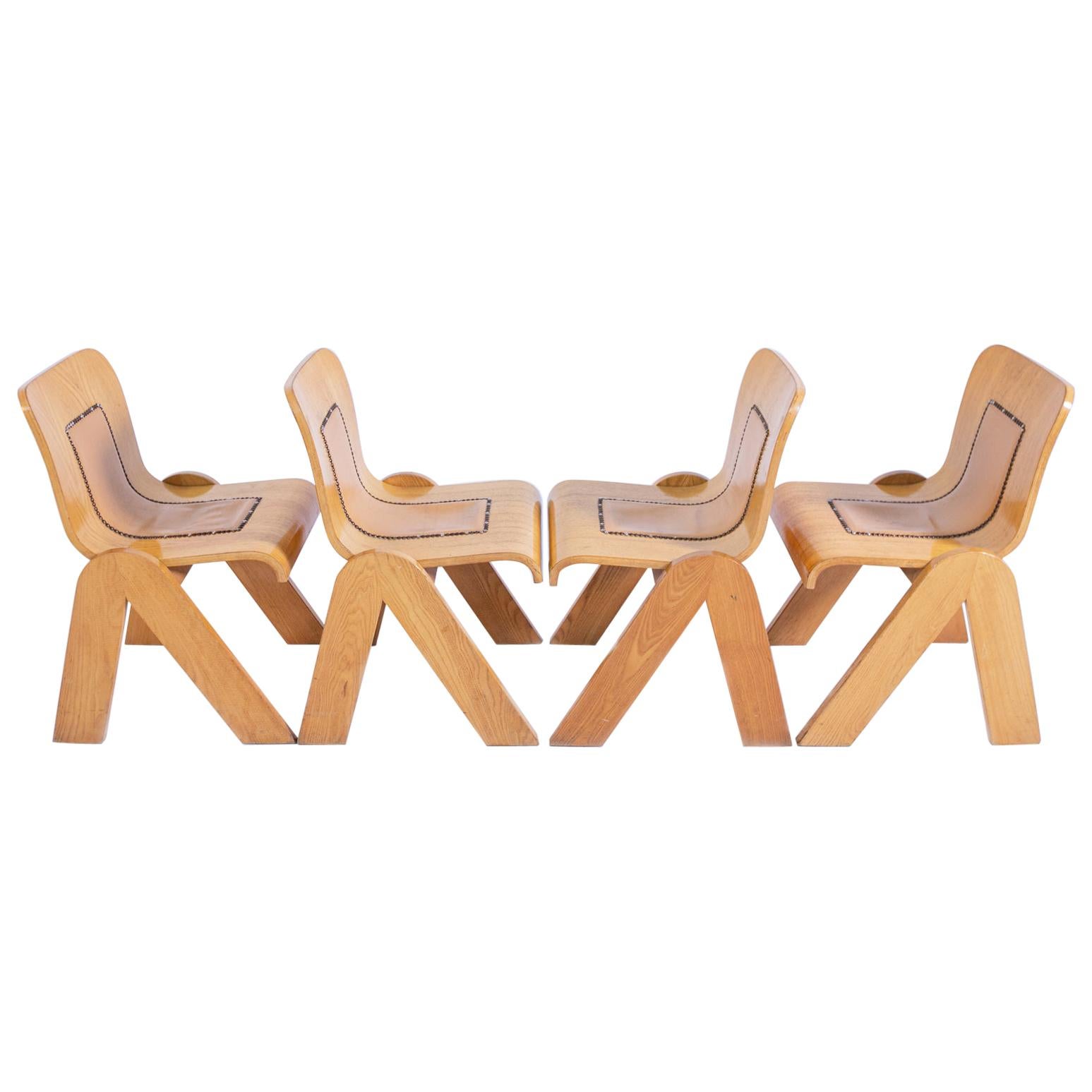 Set of Four Chairs by Gigi Babadin in Wood and Leather, 1950s