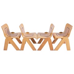 Set of Four Chairs by Gigi Babadin in Wood and Leather, 1950s