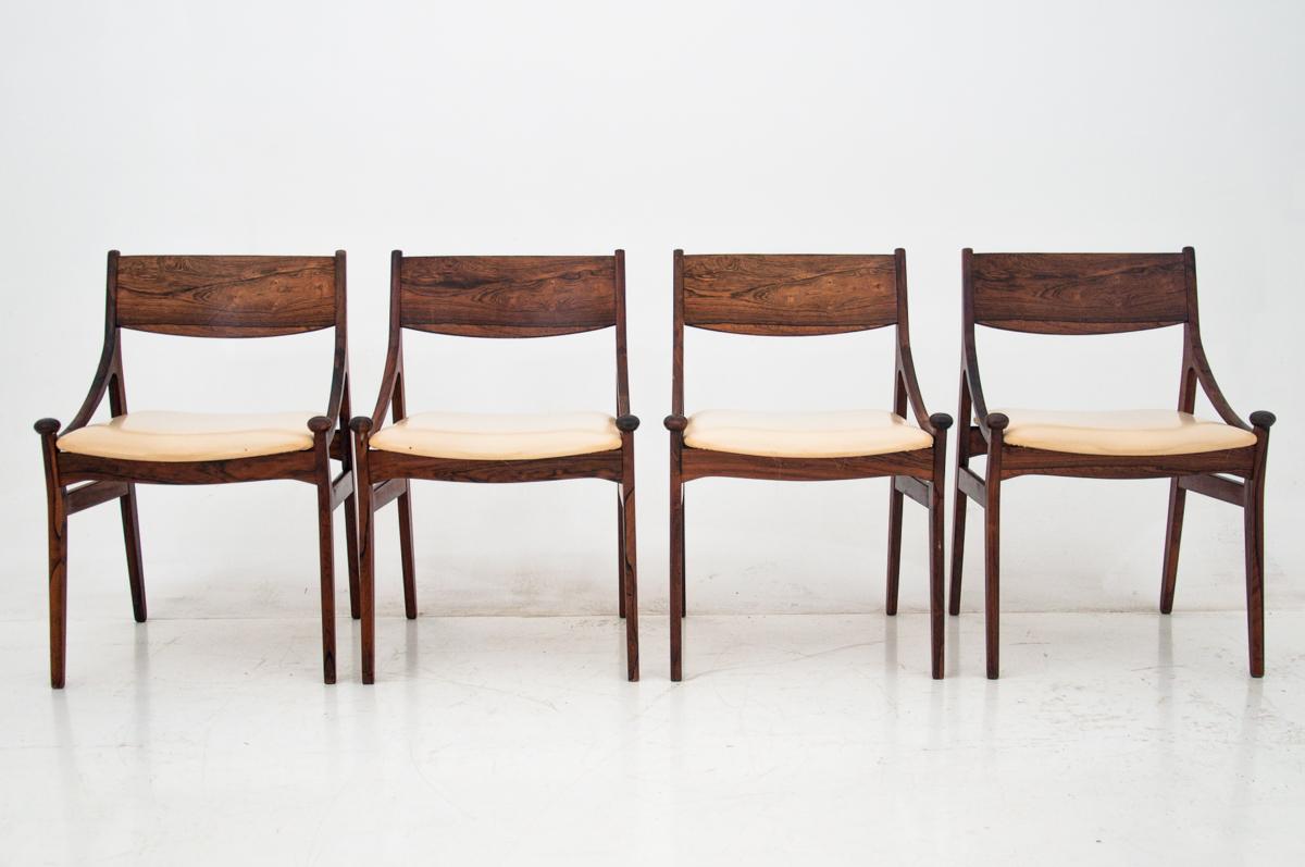 The set of four chairs was made in Denmark, designed by Vestervig Eriksen in the 1960s and made out from noble rosewood. The seats are covered with the original cream leather. 