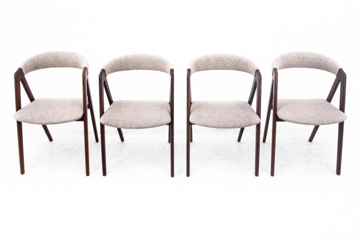 Set of four dining chairs.

Manufactured by Farstrup Mobler in the 50s/60s in Denmark.

The chairs have undergone professional carpentry and upholstery renovation. The wood has been cleaned and finished with a durable varnish. The seat and backrest