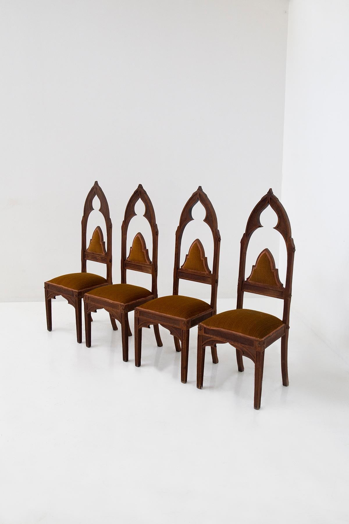 Step into the enchanting world of Venetian Gothic elegance with this exquisite Set of 4 Chairs, handcrafted circa 1920, each a masterpiece in wood. As you run your fingers along the smooth surface, you'll be captivated by the delicate inlays and the