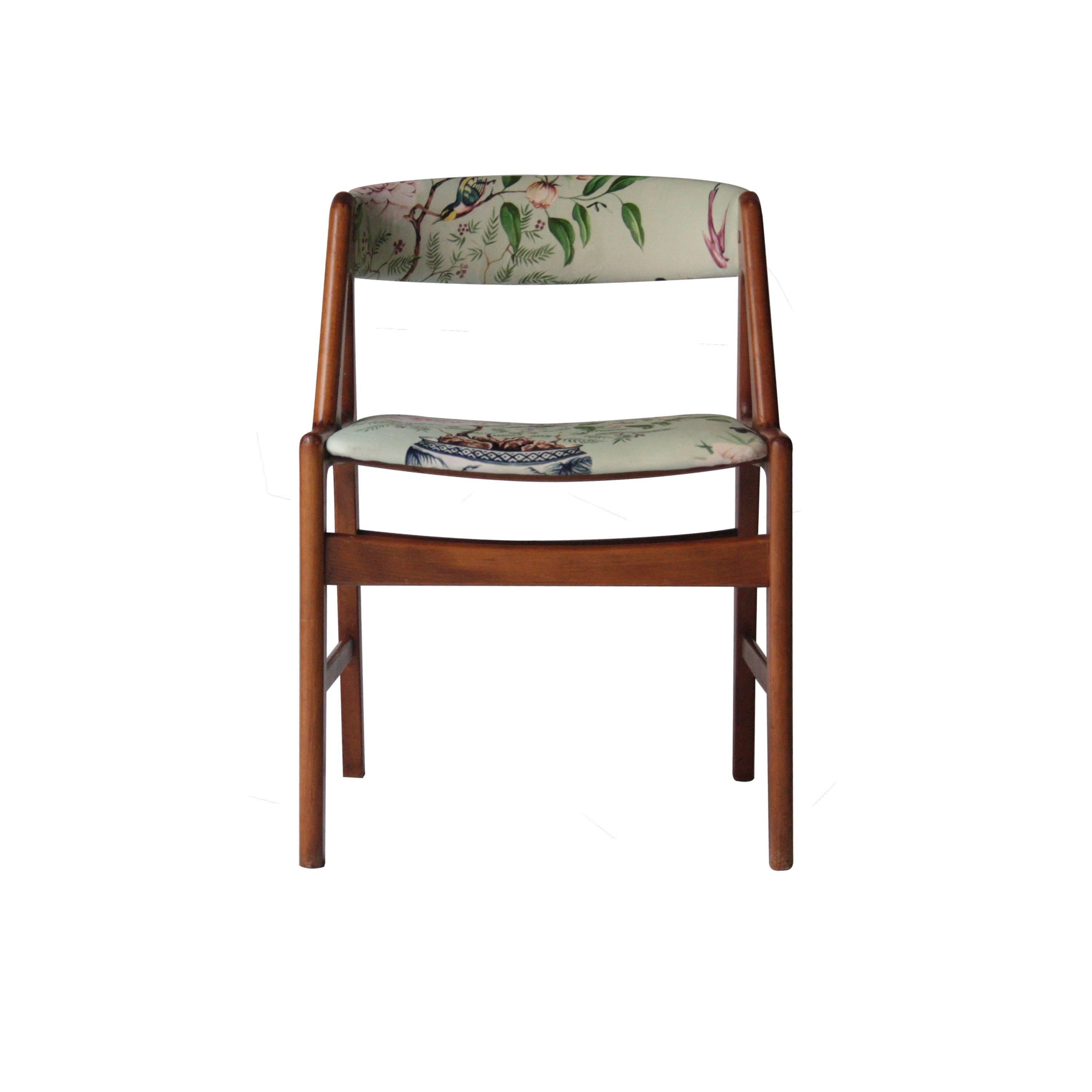 Set of four chairs model 31 designed by Kai Kristiansen. Structure made of teak with upholstered curved back and seat. Floral printed velvet upholstery.
 