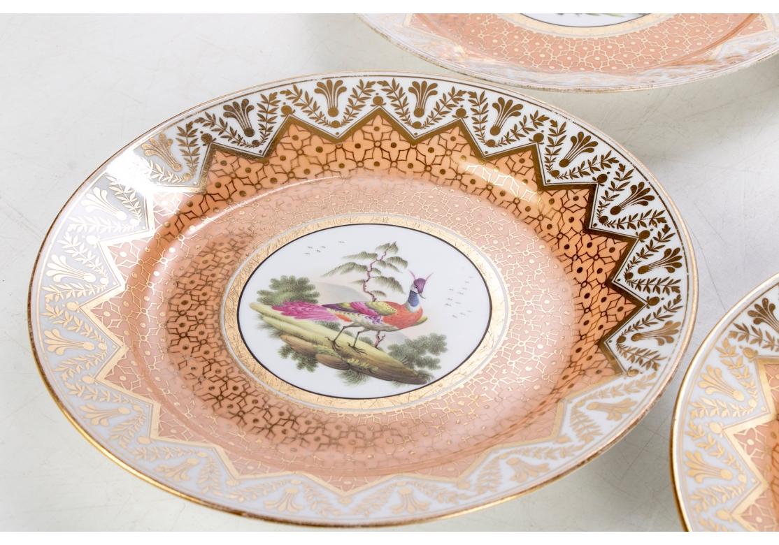Ensemble de quatre assiettes en porcelaine de Chamberlain Worcester avec oiseaux exotiques 1