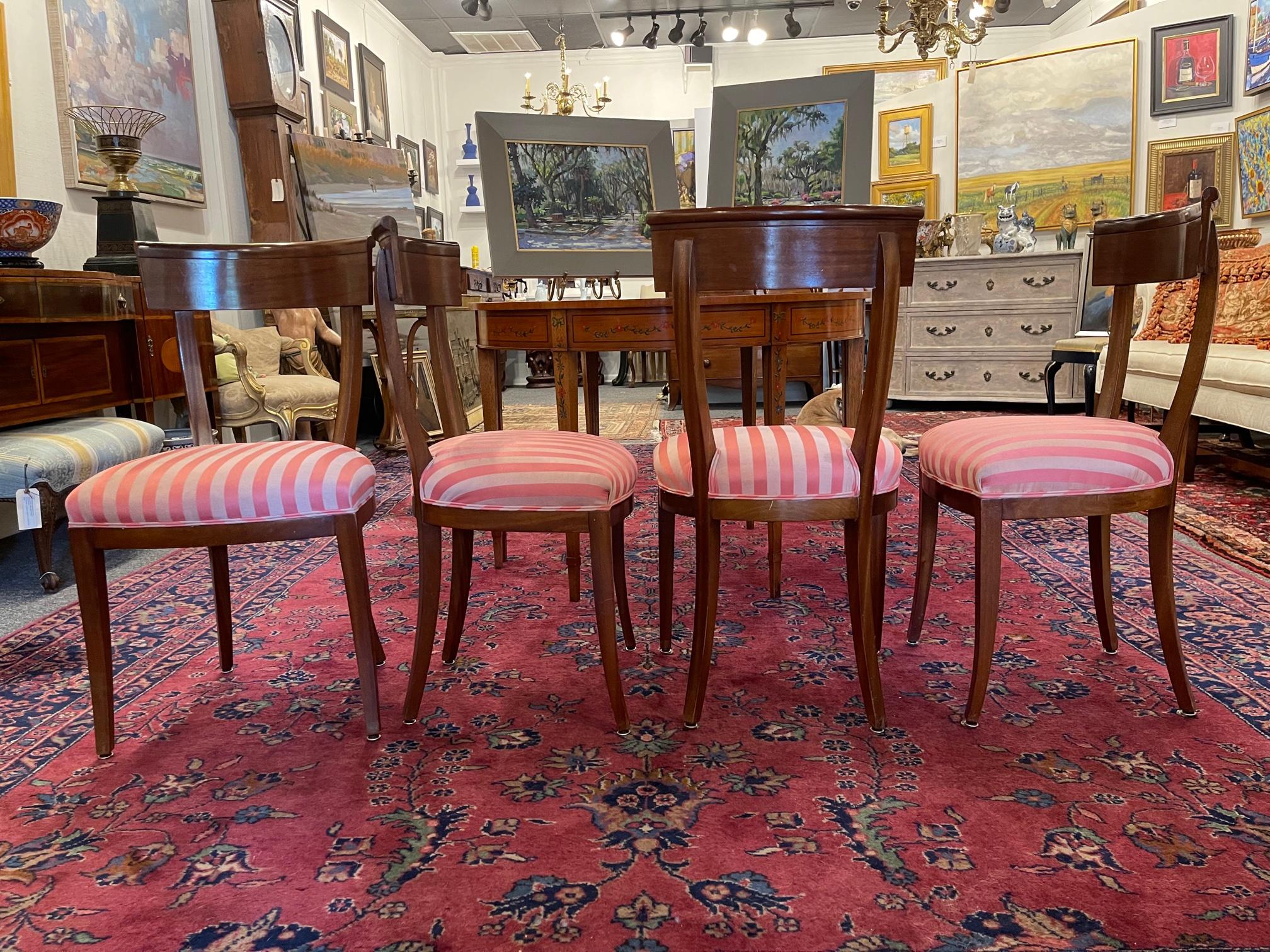 Set of four Charles X dining or side chairs, 19th century.