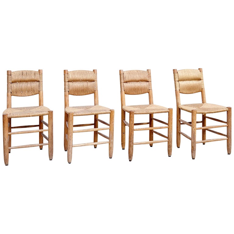 Set of Four Charlotte Perriand Chairs, circa 1950 For Sale at 1stdibs