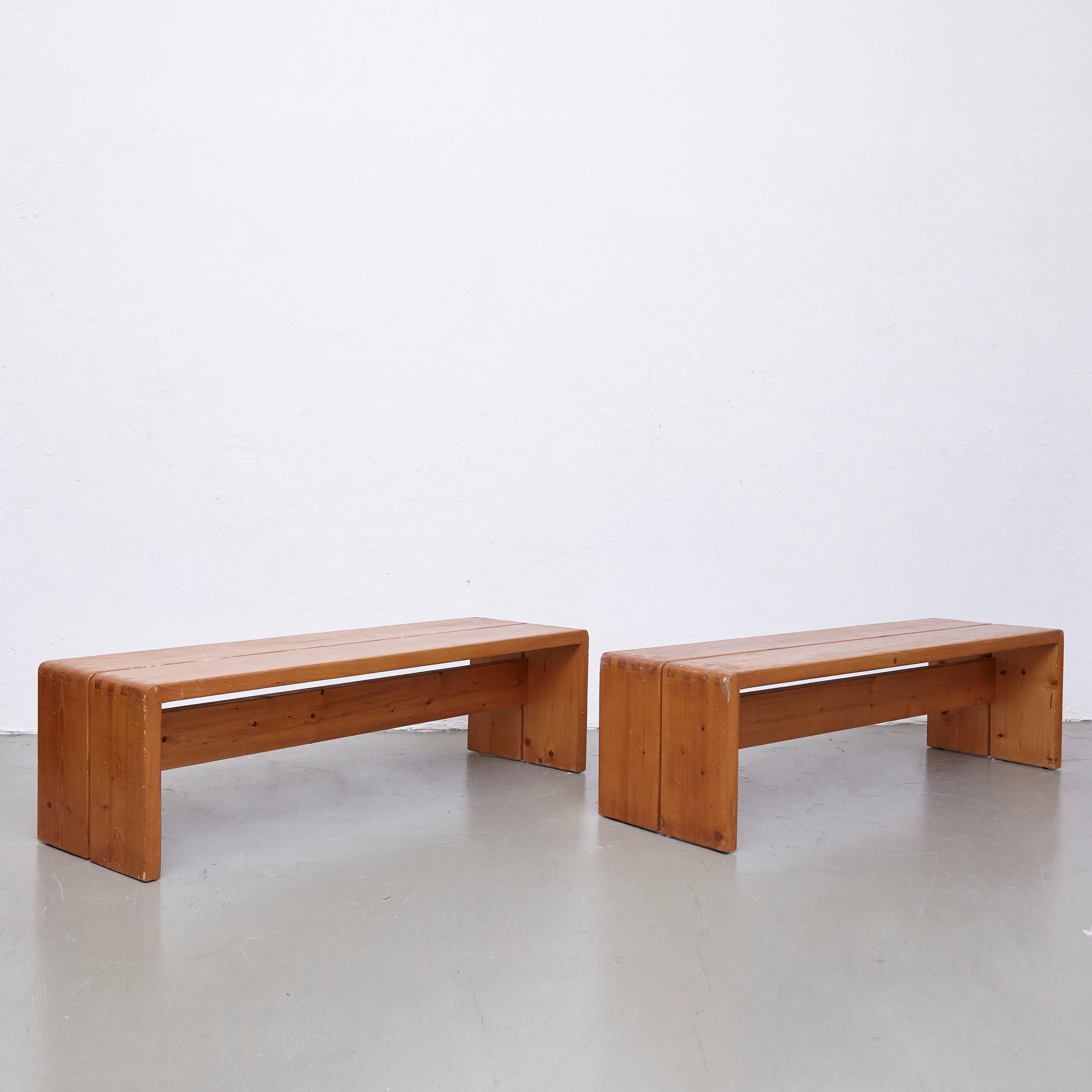 Benches designed by Charlotte Perriand for Les Arcs ski resort, circa 1960, manufactured in France.
Pinewood.

In original condition, with wear consistent with age and use, preserving a beautiful patina.

Charlotte Perriand (1903-1999) She was