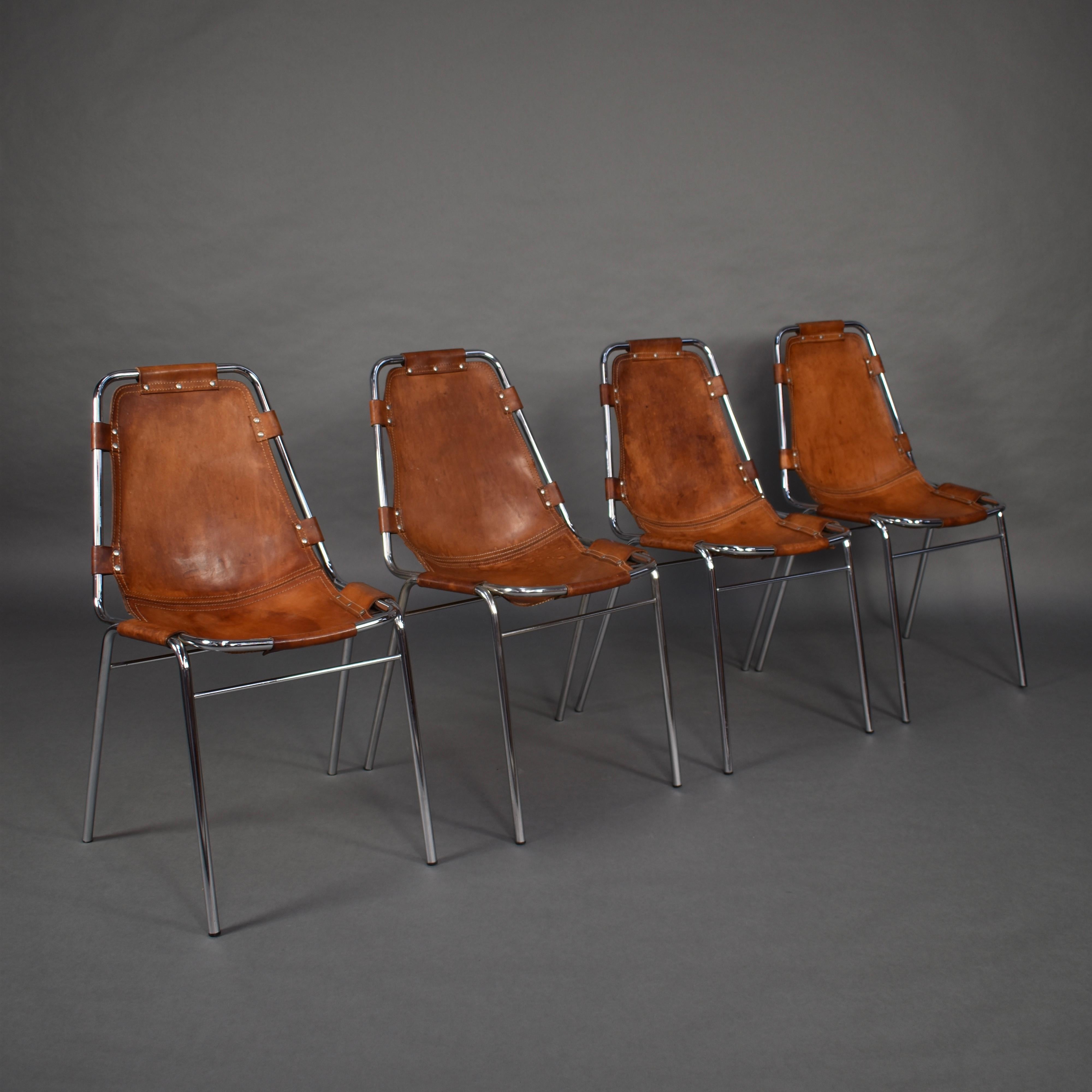 Set of 4 Les Arcs chairs selected by Charlotte Perriand.

These chairs were designed for a very luxurious ski resort in Les Arcs (Arc 1600), France in the 1960s.

Manufacturer: DalVera

Period: circa 1960

Model: Les Arcs dining chair

Material: