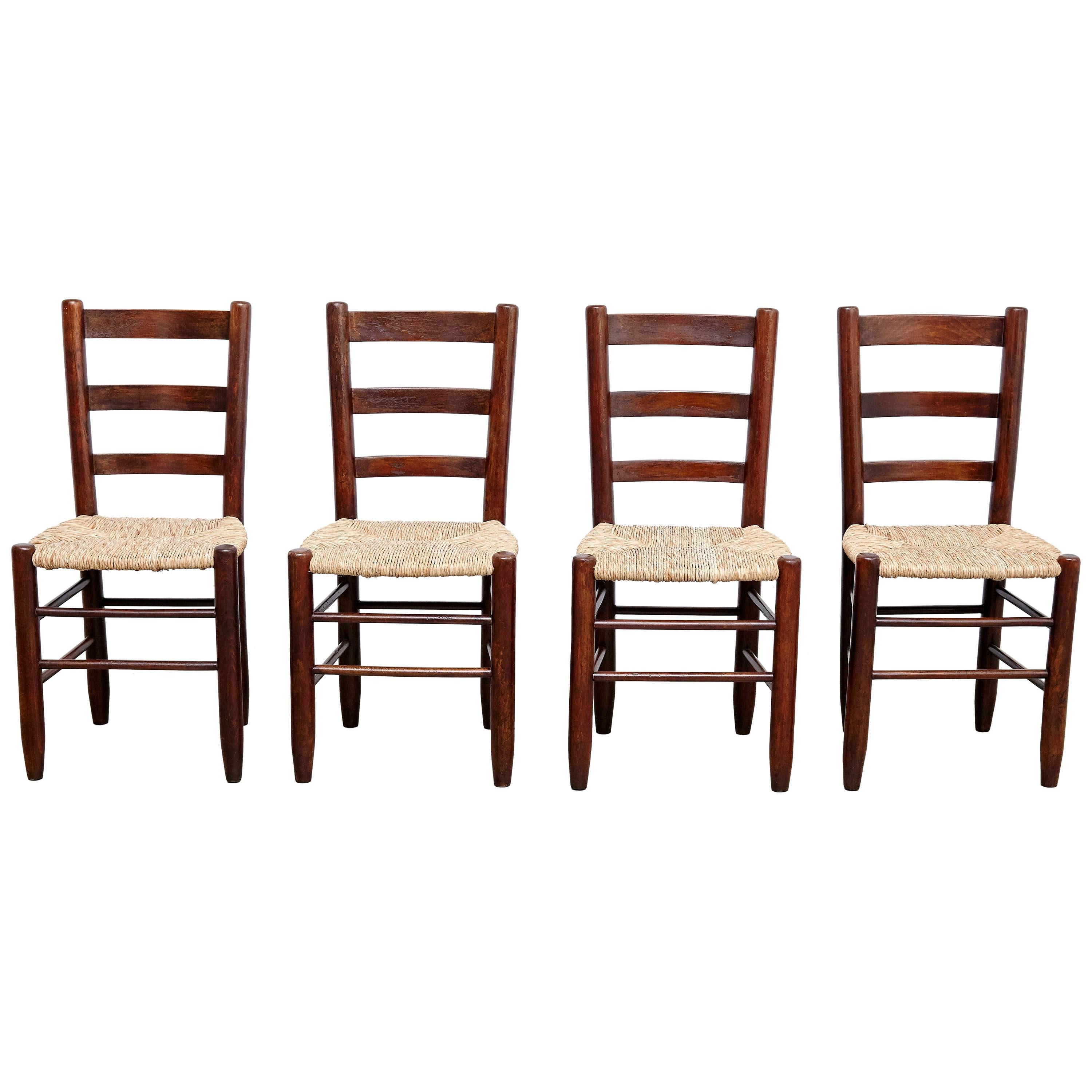 Set of Four Charlotte Perriand Mid-Century Modern Wood Rattan FrenchNº 19 Chairs