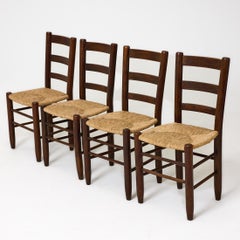 Lot de quatre chaises « N.19 » de Charlotte Perriand, en bois et rotin, de style « Mid-Century Modern »