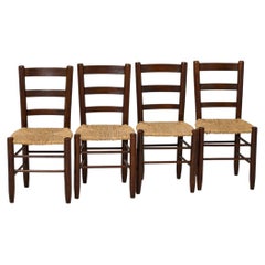 Lot de quatre chaises « N.19 » de Charlotte Perriand, en bois et rotin, de style « Mid-Century Modern »