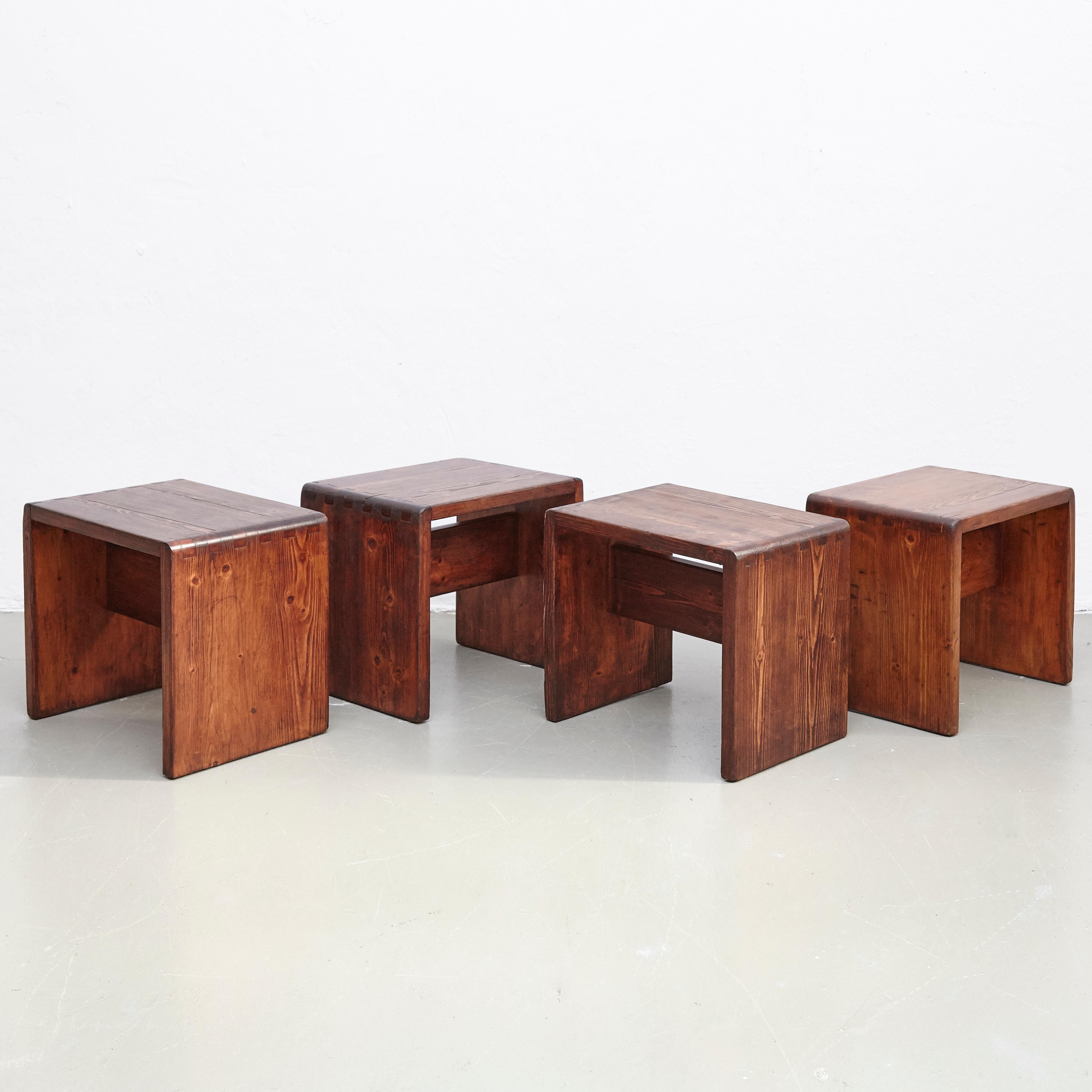 Stools designed by Charlotte Perriand for Les Arcs ski Resort, circa 1960, manufactured in France.
Pine wood.

In good original condition, with minor wear consistent with age and use, preserving a beautiful patina.

Charlotte Perriand (1903 -