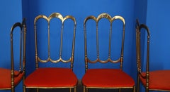 Set of four Chiavarine chairs in brass and orange velvet, Italy, 1950s