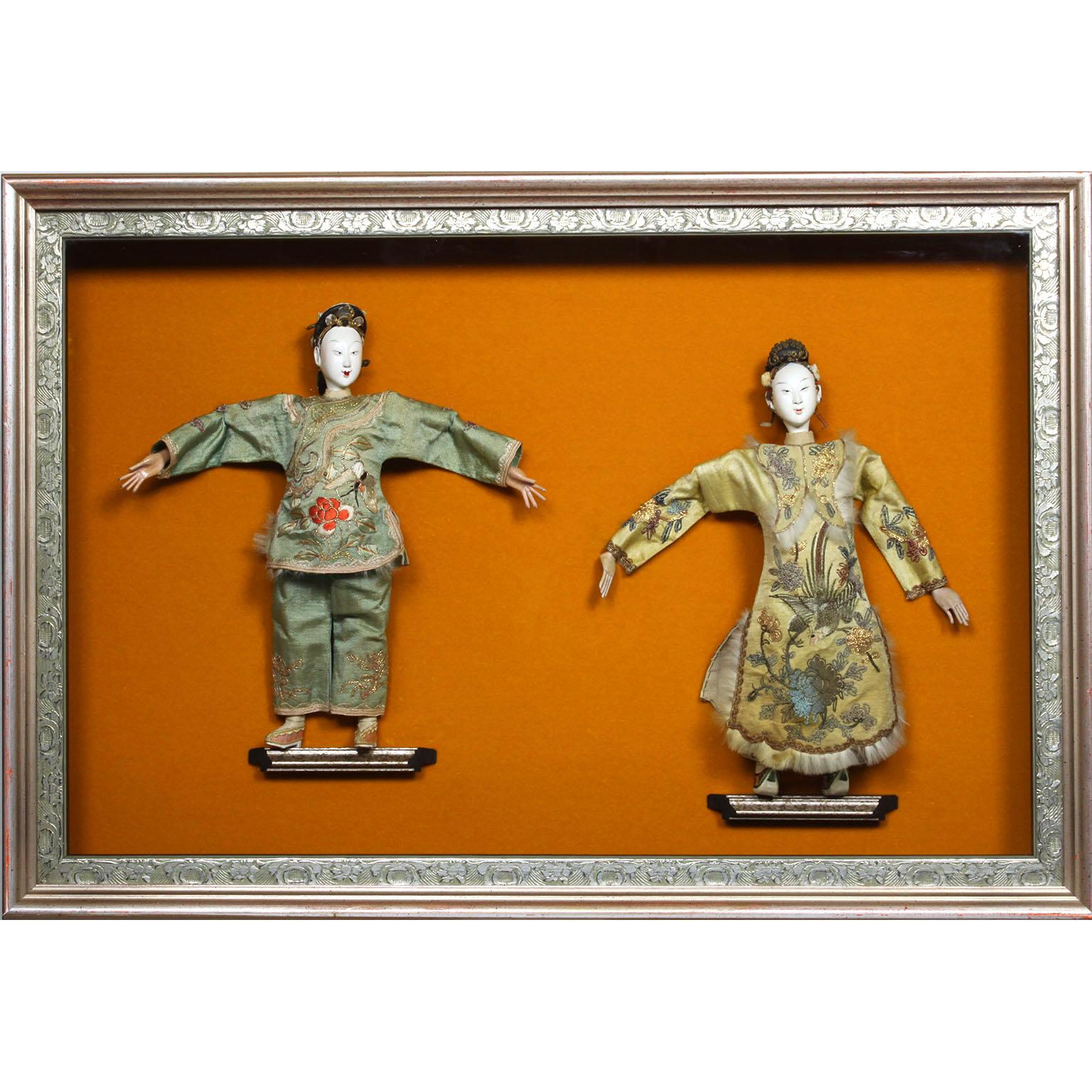 A fine and rare set of four Chinese 19th-20th century Henan Opera dolls. The beautifully carved soft wood, paper mâché and paste dolls of three female Opera performers and one male, all with finely painted heads, sandals and hands, wearing