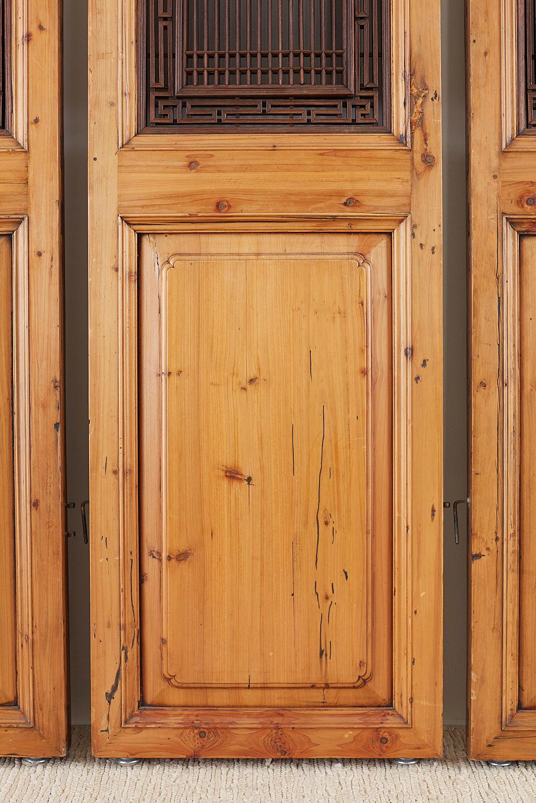 Hand-Carved Set of Four Chinese Carved Elm Lattice Door Panels For Sale