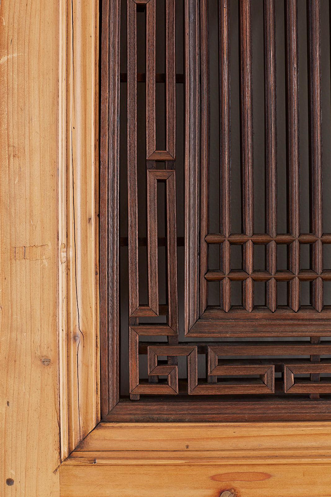 19th Century Set of Four Chinese Carved Elm Lattice Door Panels