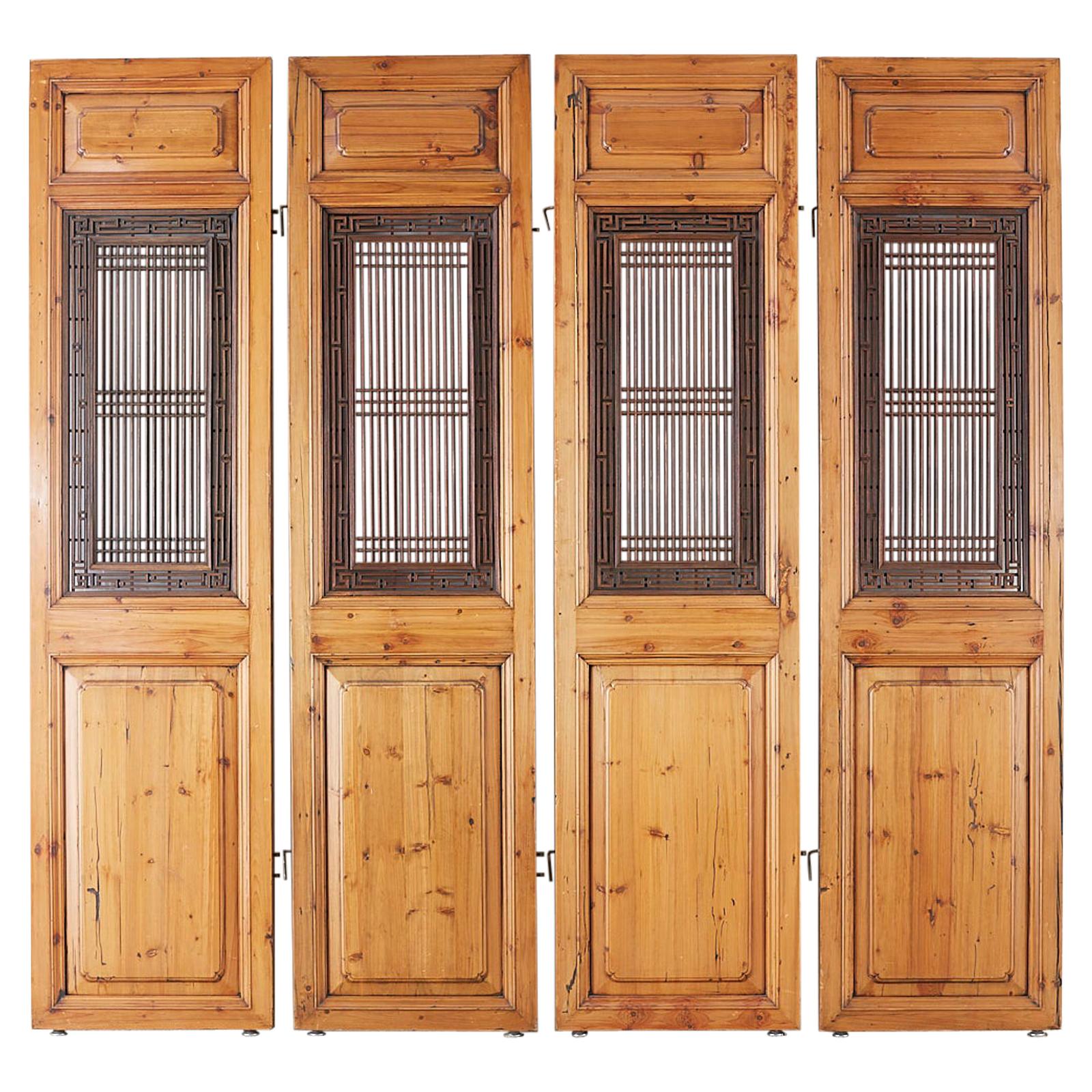 Set of Four Chinese Carved Elm Lattice Door Panels For Sale
