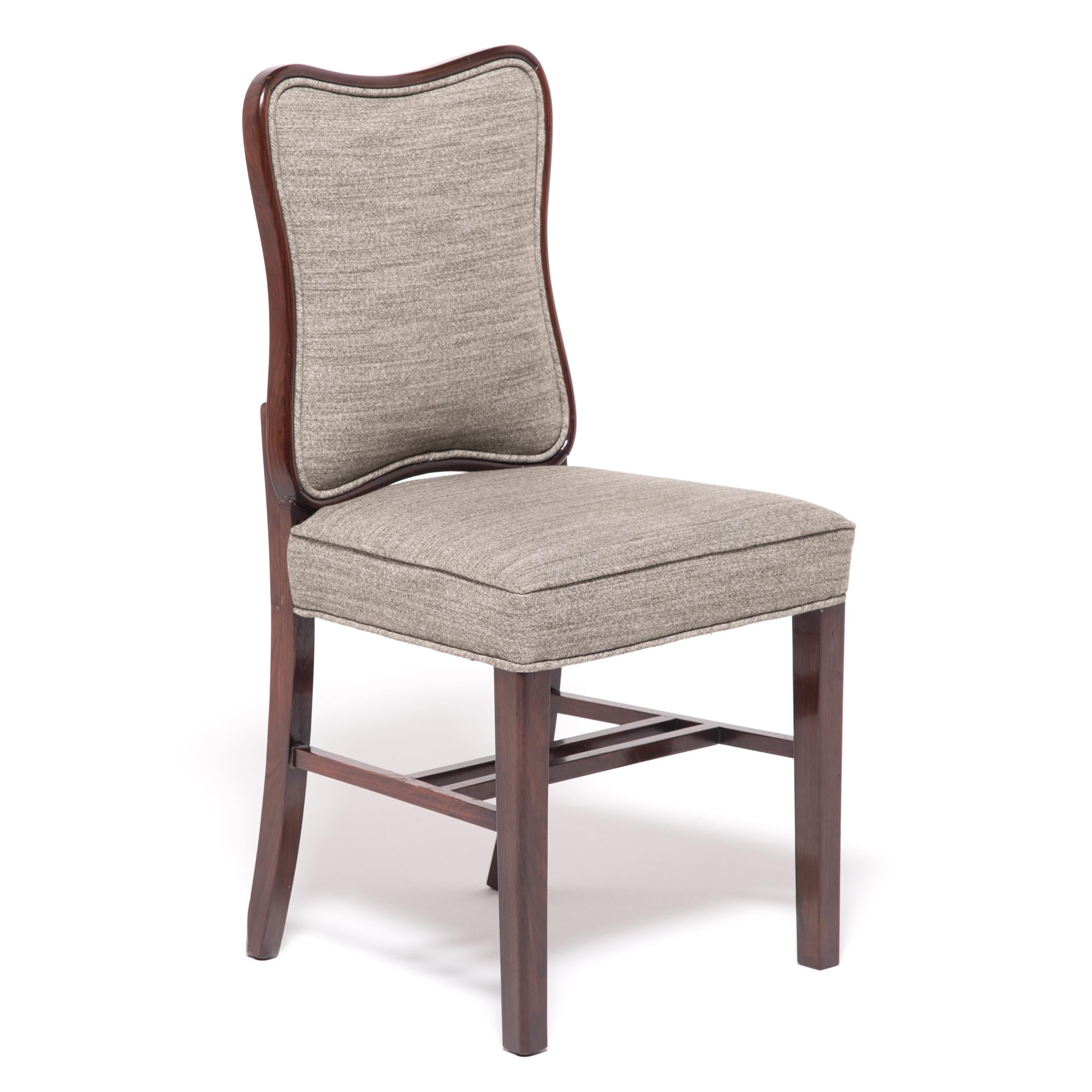 Made in the 1930s to satisfy the worldwide hunger for all things Art Deco, these unique chairs combine the streamlined style of the era with a Classic Chinese aesthetic. The beautiful hardwood frames hint at tradition with bamboo-like modeling and