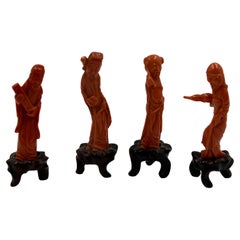 Set of four Chinese figures carved in coral