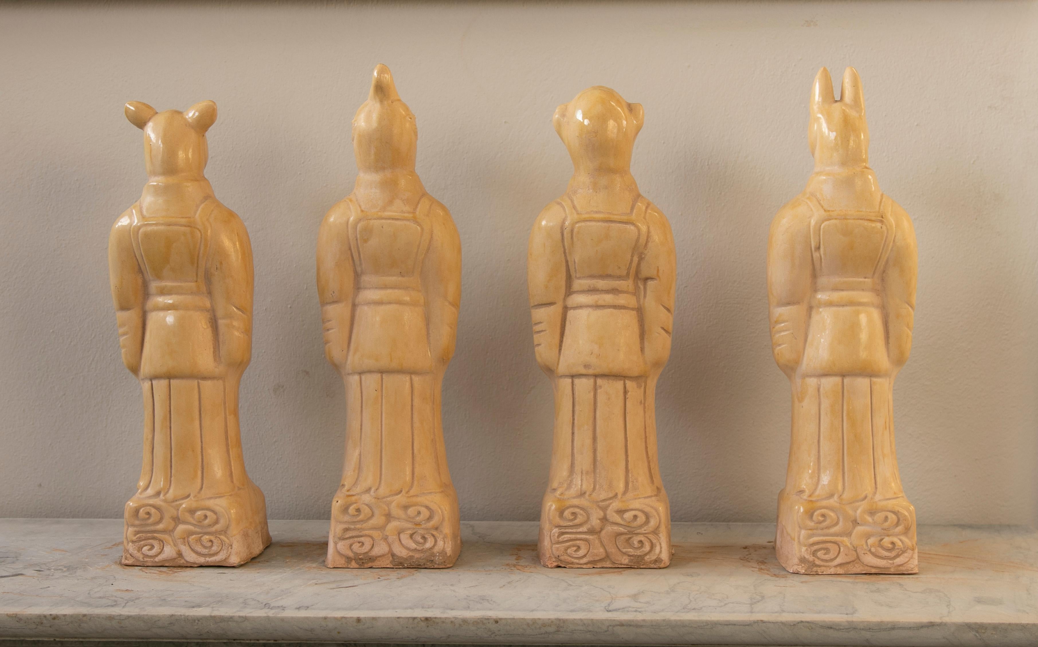Set of Four Chinese Mythological Gods in Beige Glazed Terracotta In Good Condition For Sale In Marbella, ES