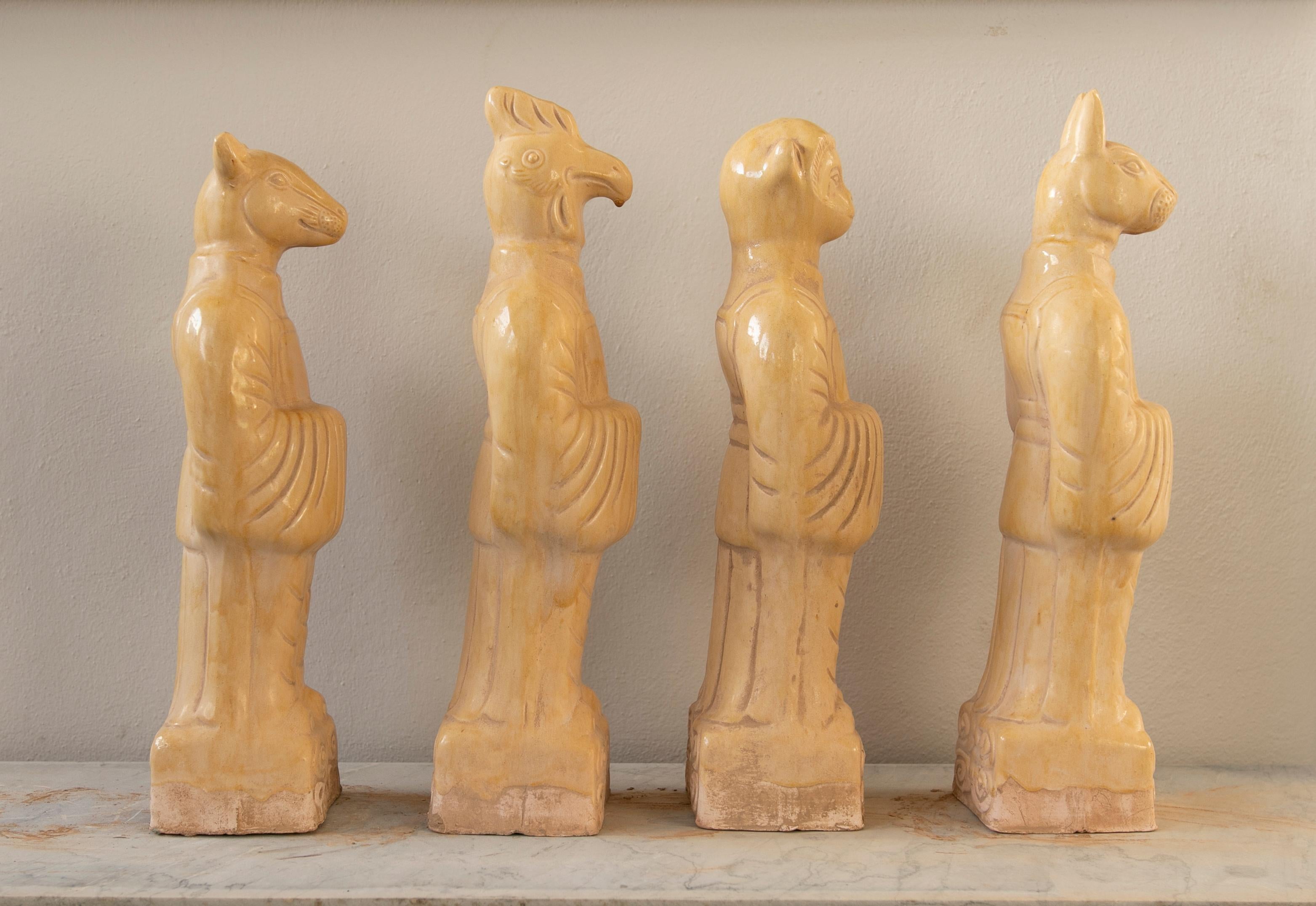 Late 20th Century Set of Four Chinese Mythological Gods in Beige Glazed Terracotta For Sale