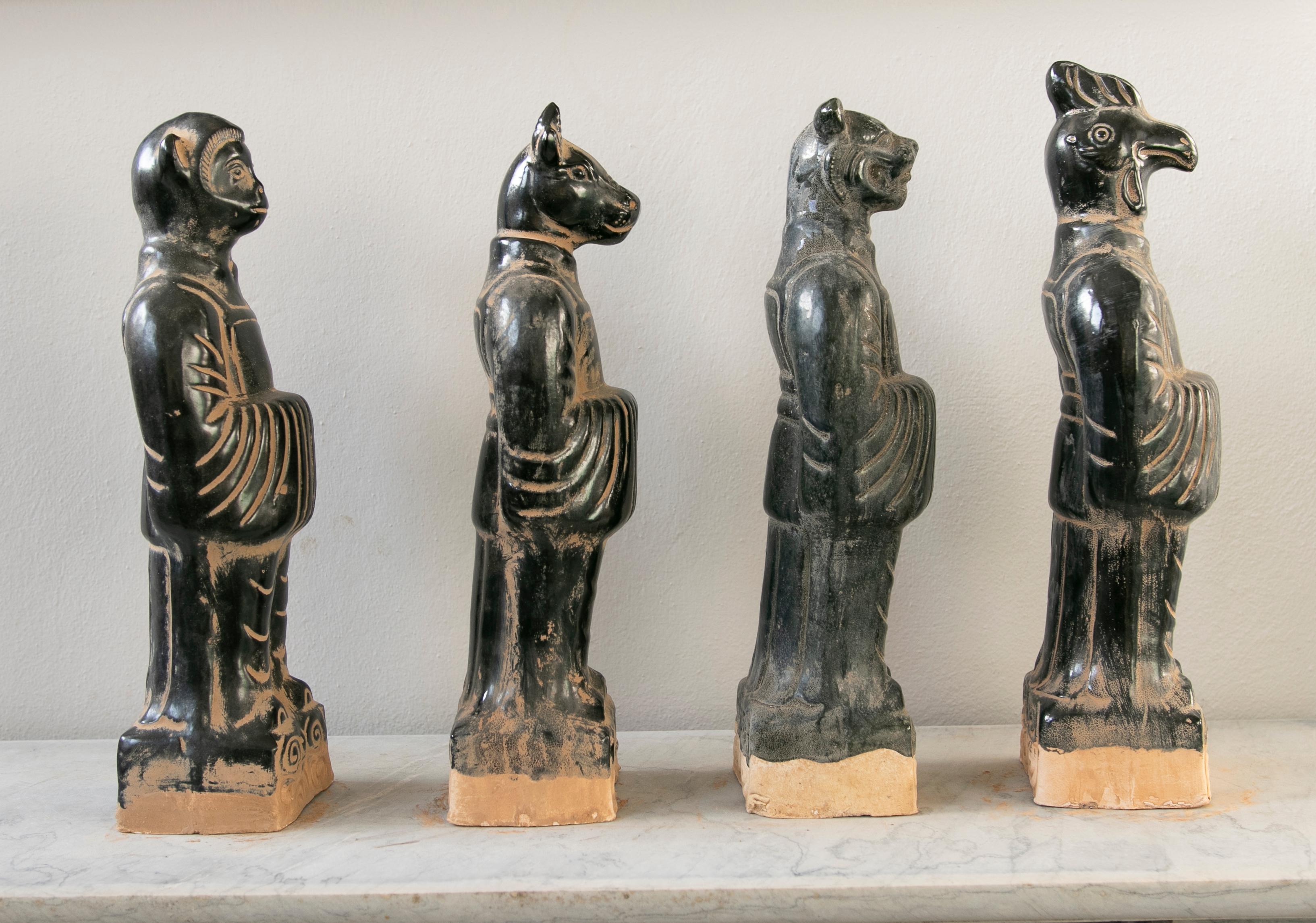 Late 20th Century Set of Four Chinese Mythological Gods in Black Glazed Terracotta For Sale