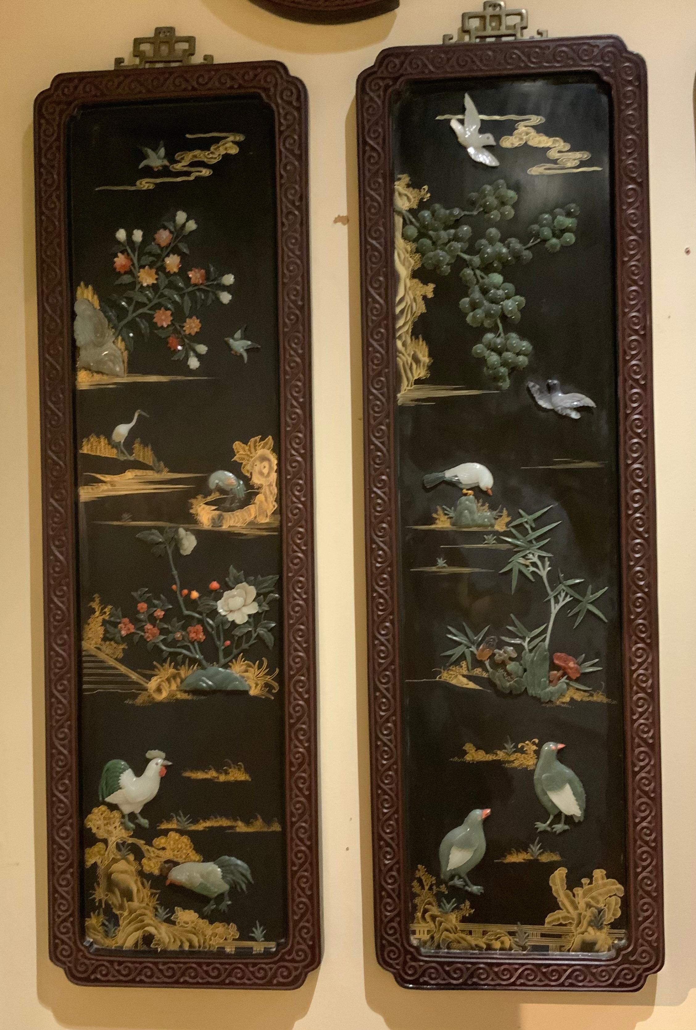 Set of four excellent panels in wood carved frames with semi precious 
Stones of jade, coral and a combination of other hard stones 
The carving is of the highest quality and the condition is exceptional.
