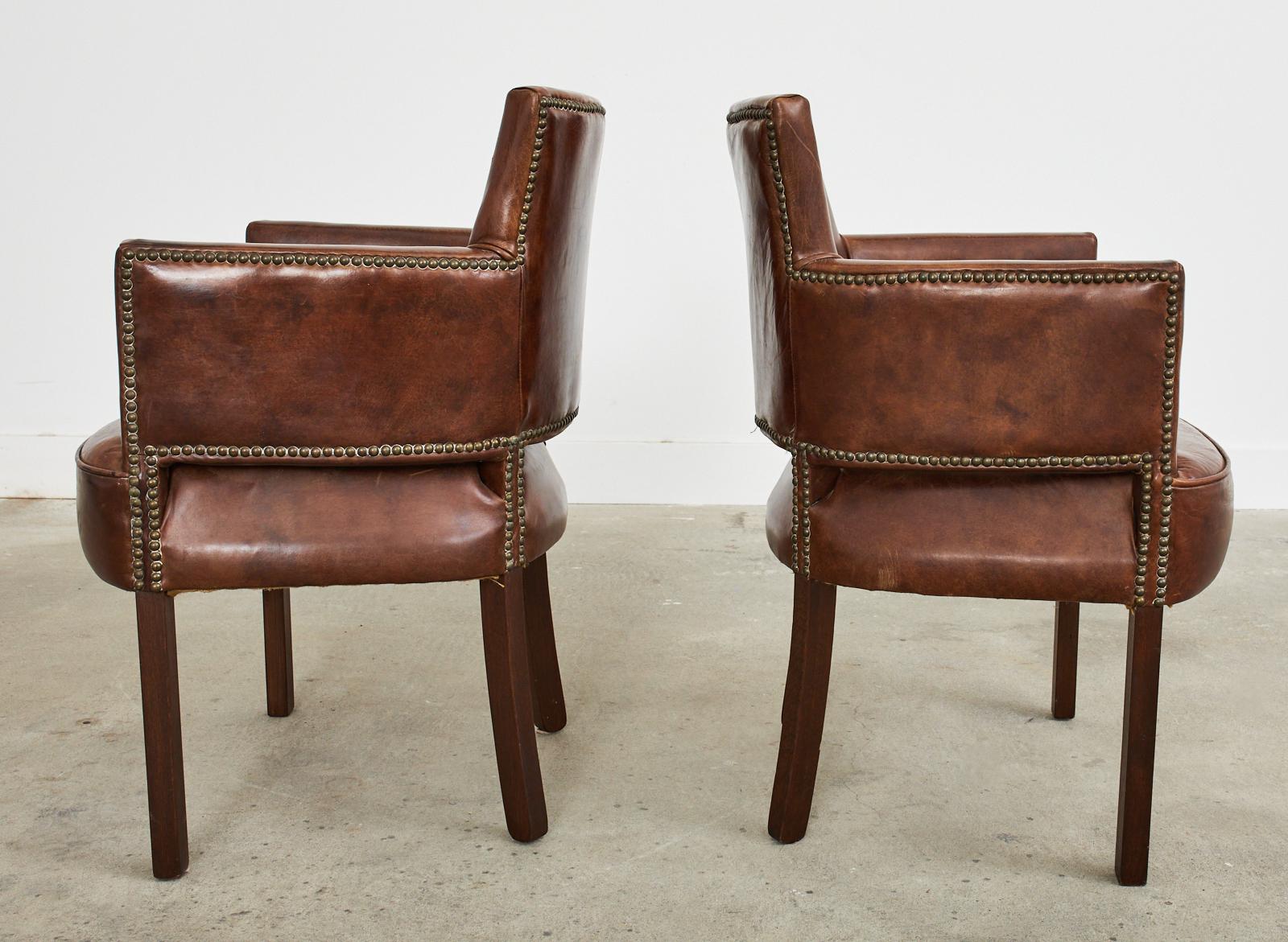 Set of Four Christian Audigier Cigar Leather Monogram Club Chairs In Distressed Condition For Sale In Rio Vista, CA
