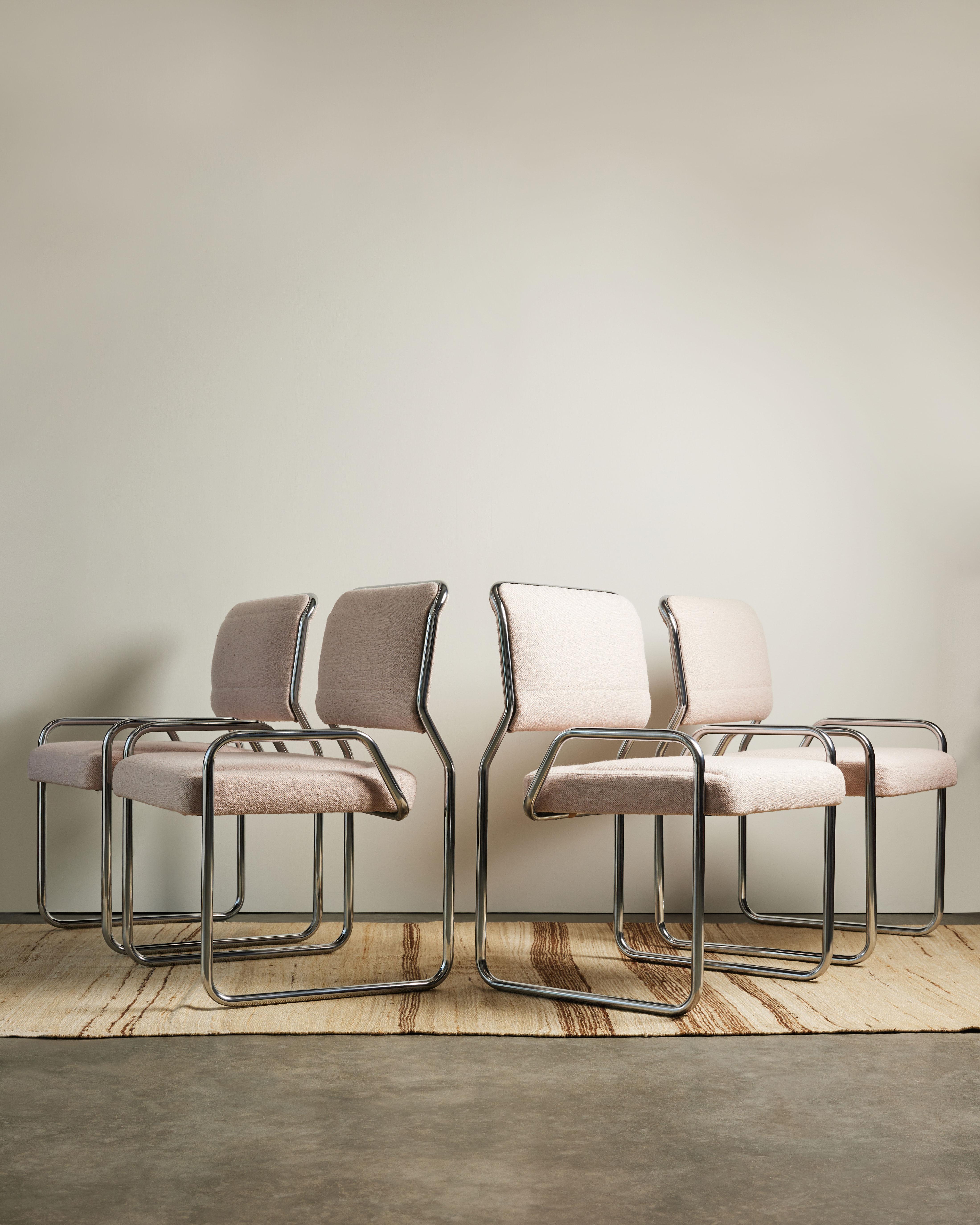 Cool, unique looking dining chairs with new upholstery. We maintained the channeling present on the original upholstery and think it adds beautifully to the overall design. Similar chairs have been classified as having come from Air France lounges.