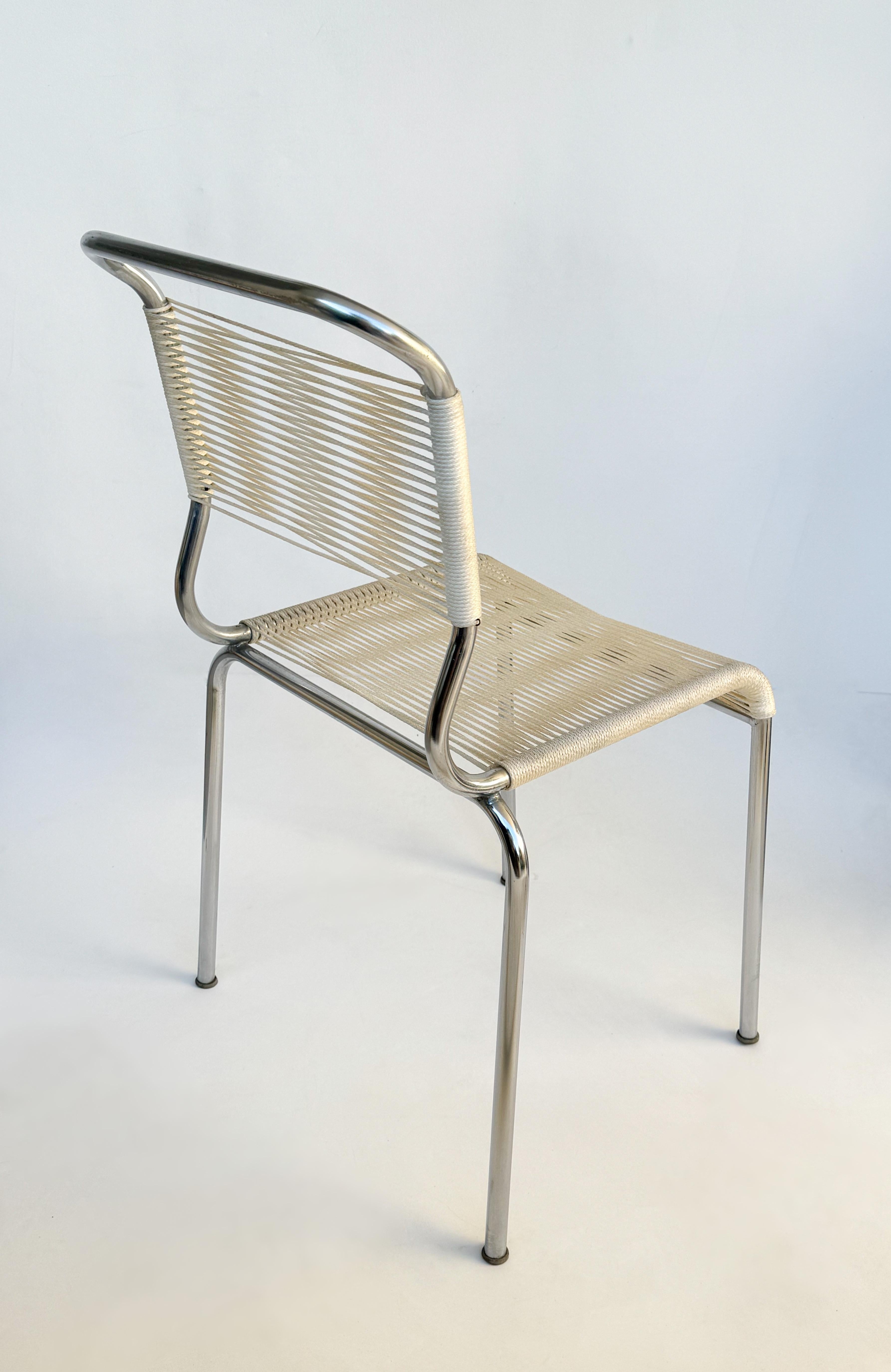 Mid-Century Modern Ensemble de quatre chaises à cordes chromées par Andre Dupre pour Knoll international en vente