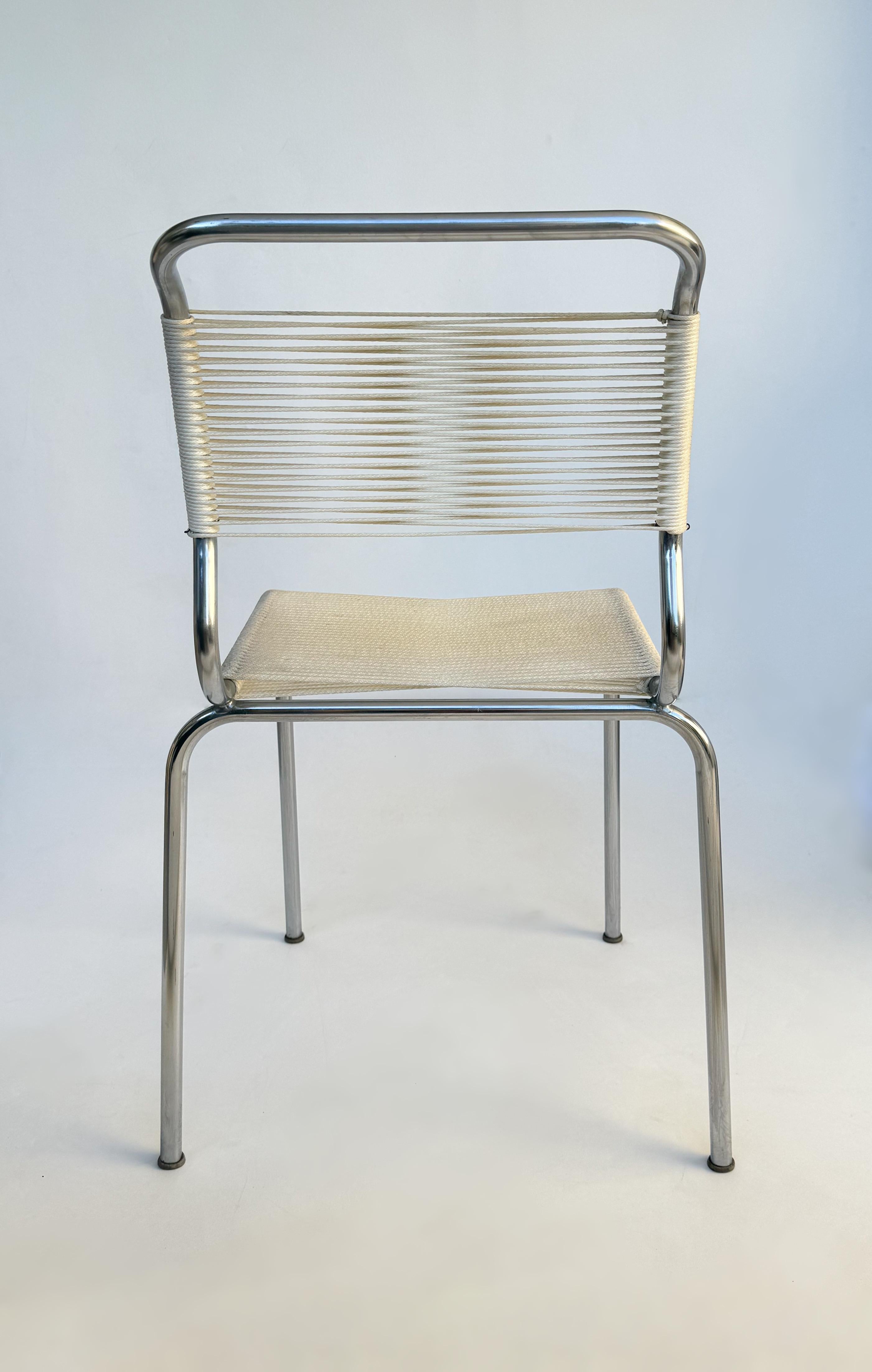 Ensemble de quatre chaises à cordes chromées par Andre Dupre pour Knoll international Bon état - En vente à Palm Springs, CA