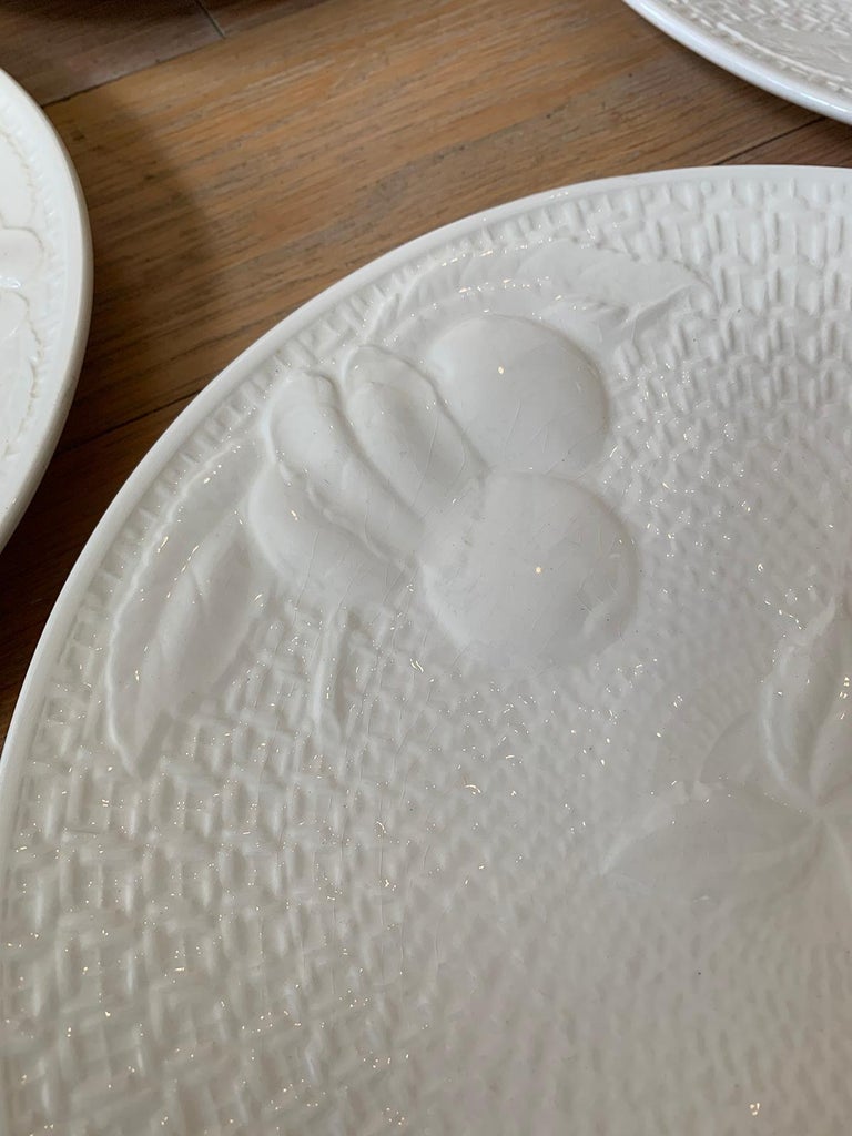 Set of Four circa 1950s White Ceramic Embossed Fruit Plates by Ed