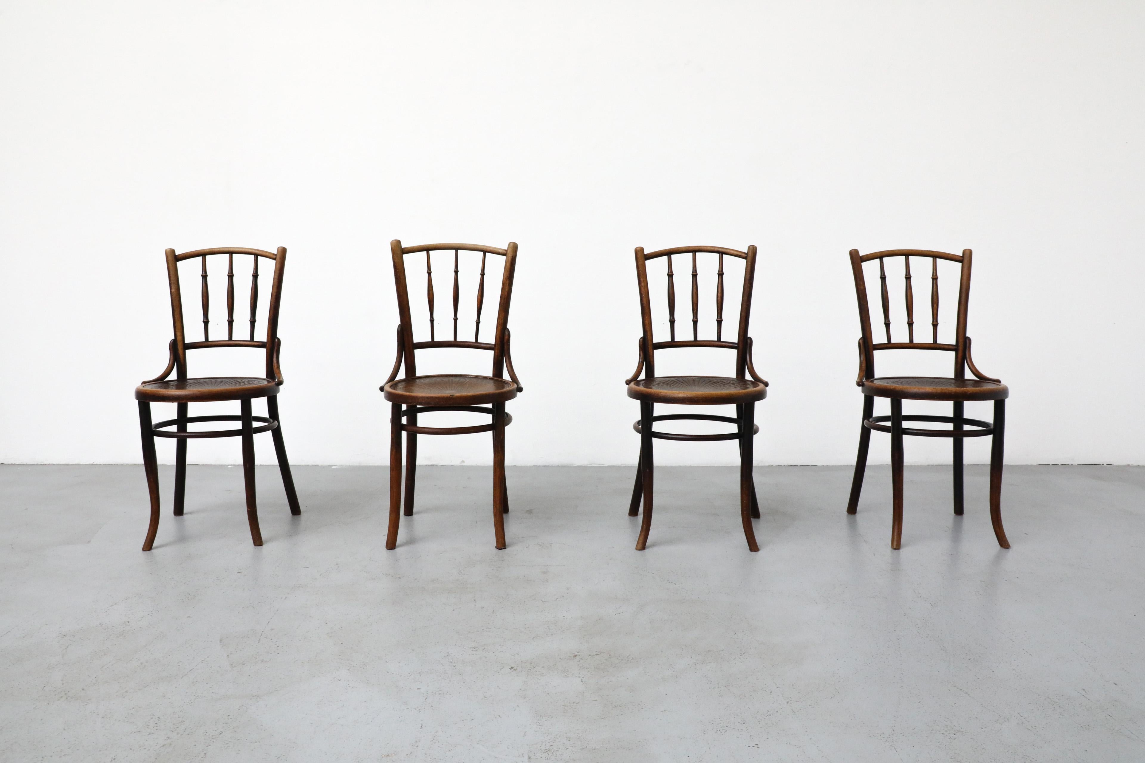 Early 1900's, classic Thonet style bentwood cafe chairs by Mundus and J. & J. Kohn. Mundus was a furniture manufacturing company that operated in various locations across the Austro-Hungarian Empire during the late 19th and early 20th centuries.