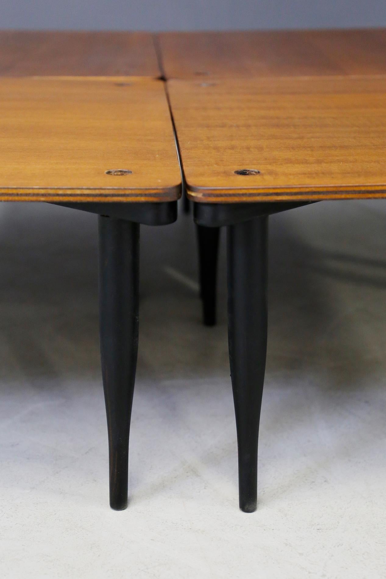 Stackable coffee tables model T8 designed by Vico Magistretti and produced by Azucena, Milan (Italy), 1950.
The structure is in solid ebonized wood and the top is in plywood. The feet are conical shaped.
They may have slight traces of use due to