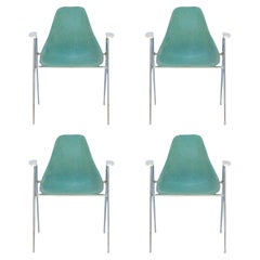 Set of Four Comfortable Turquoise Fiberglass Armchairs on Chrome Bases