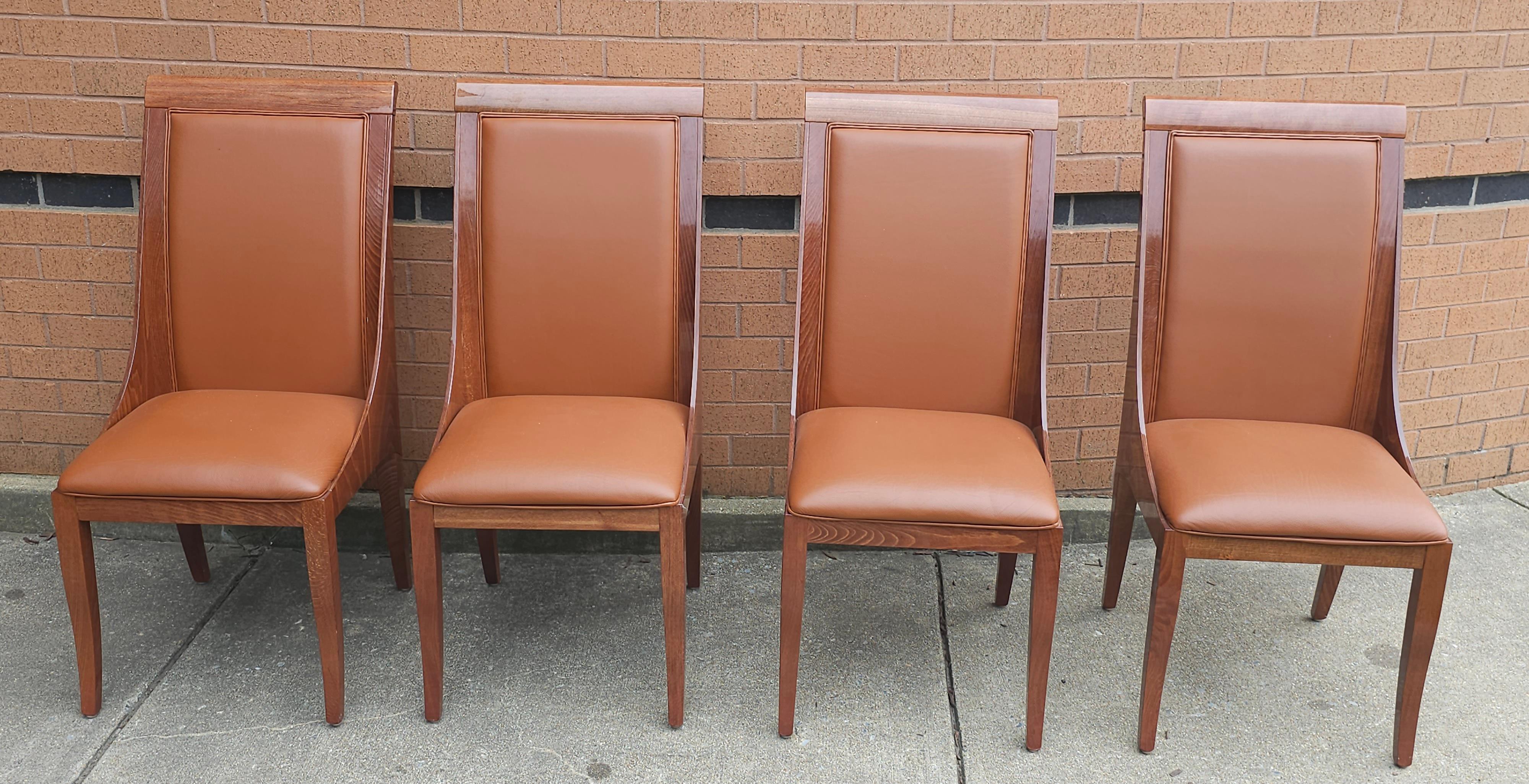 A beautiful Set of Four Constantini Pietro glossy finish Rosewood and soft, top grain Leather Upholstered Dining Chairs in great condition. Measure 19