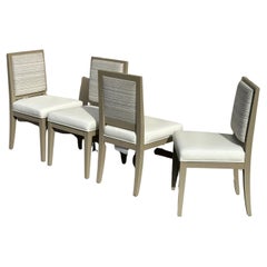 Juego de cuatro sillas de comedor contemporáneas con asiento de cuero blanco by Silva