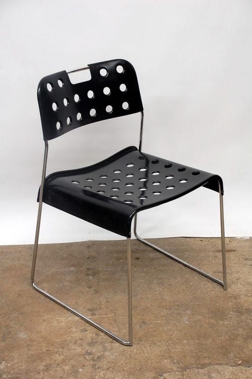 Set of four 'Omstak' perforated metal chairs designed by Rodney Kinsman in 1971 and produced by Bieffeplast.

A TRIBUTE TO BIEFFE AND Bieffeplast,
31 January 2018

On February 10th, was opened “Scraps Bieffe 1953/1999. In the sign of metal.”,