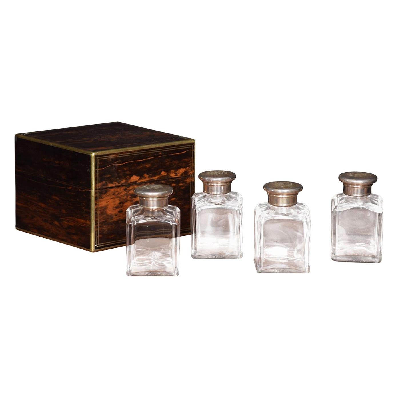 Set of Four Coromandel Cased Cologne Bottles For Sale