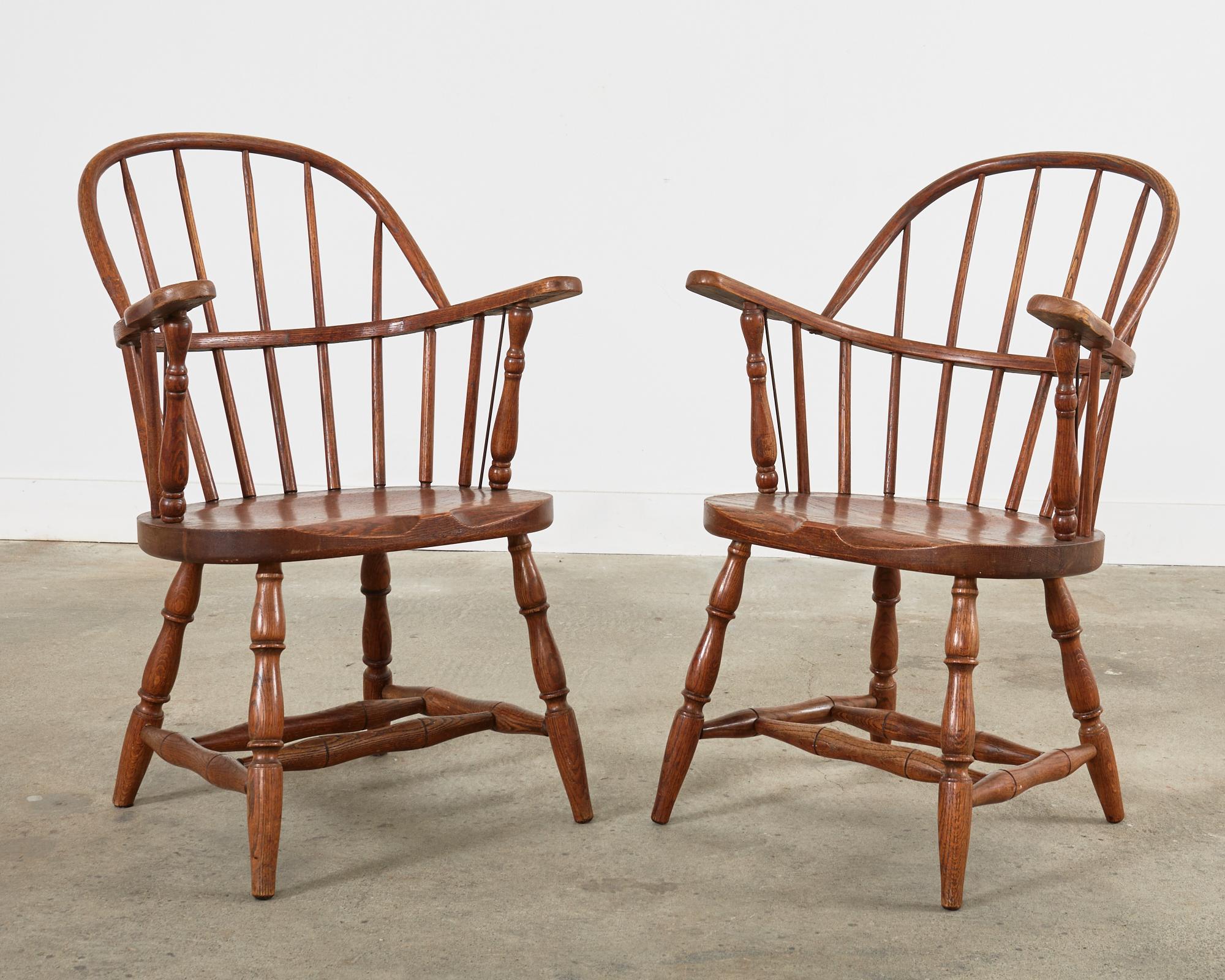 20th Century Set of Four Country English Oak Hoop Back Windsor Armchairs For Sale