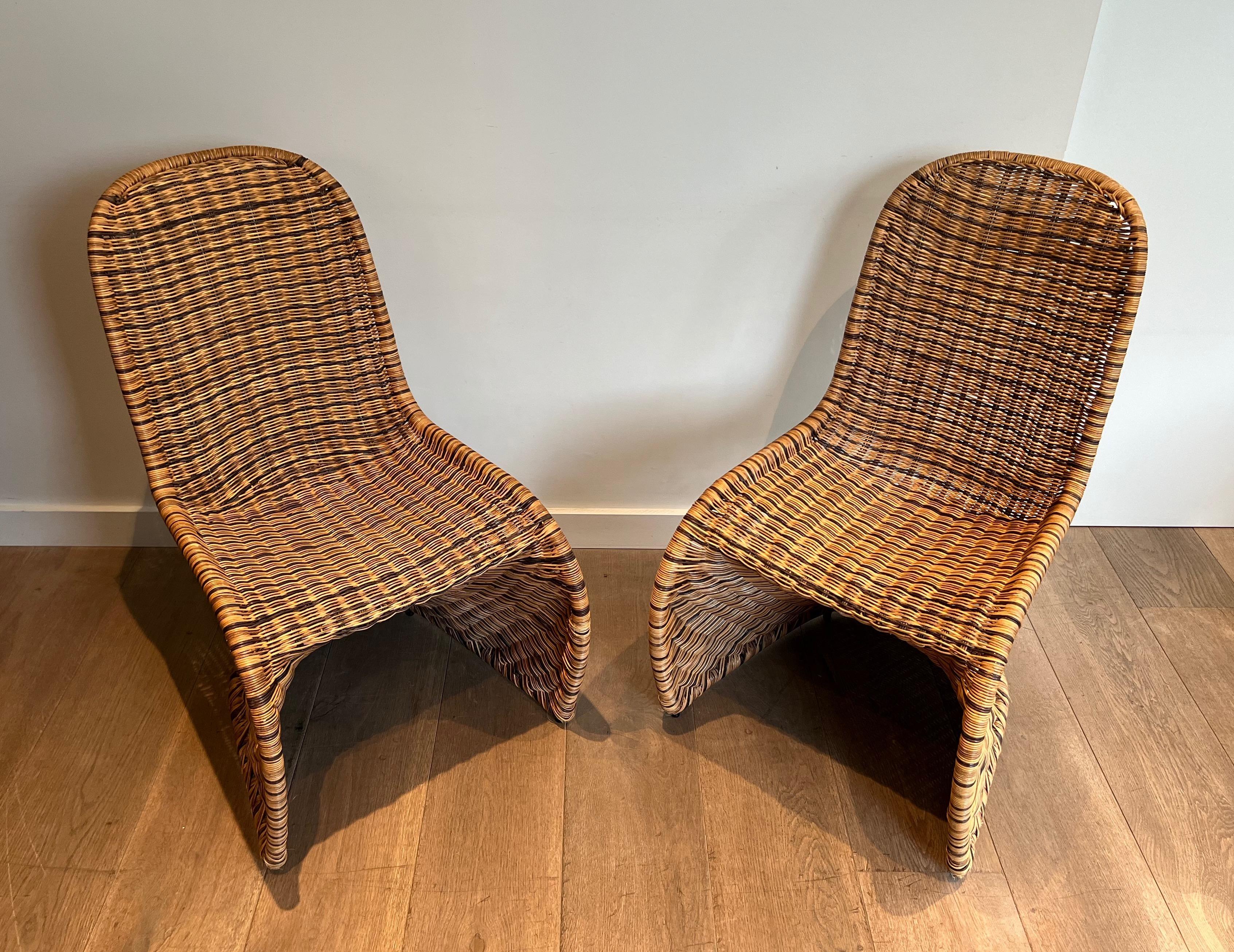 French Set of Four Curved Rattan Chairs For Sale