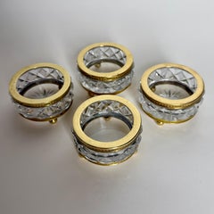 Set di quattro cantinette per sale e pepe in cristallo tagliato e ottone, inizio XX secolo