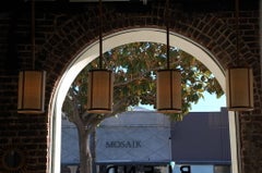 Set di quattro lampade a sospensione 'Cylindre' in ottone patinato e rafia, Design Frères