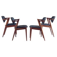 Set of four Danish Kai Kristiansen model 42 rosewood & leather dining chairs