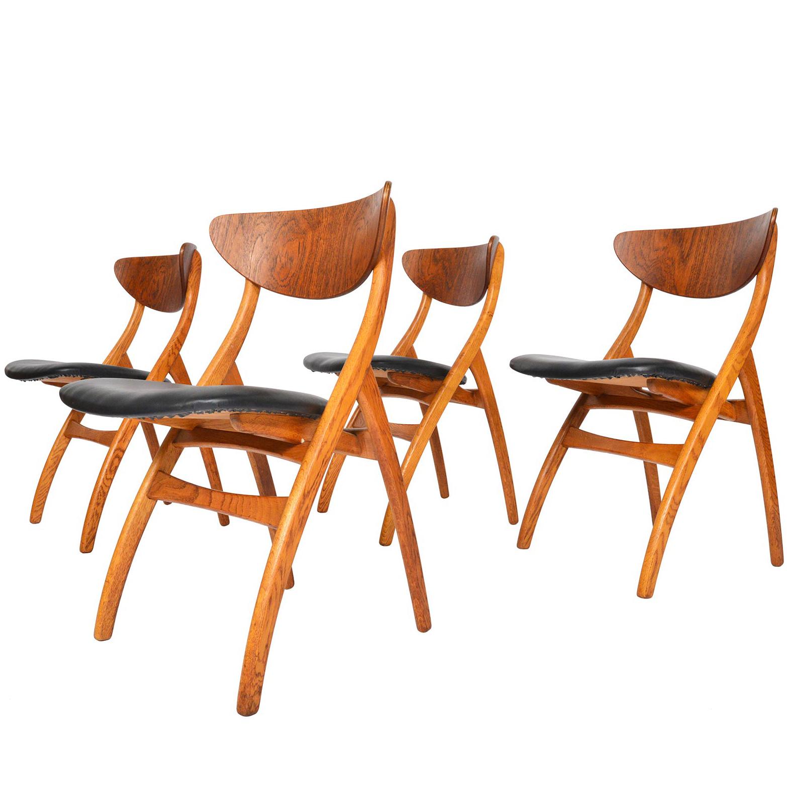 Set of Four Danish Mid-Century Modern Teak and Oak Swag Leg Dining Chairs