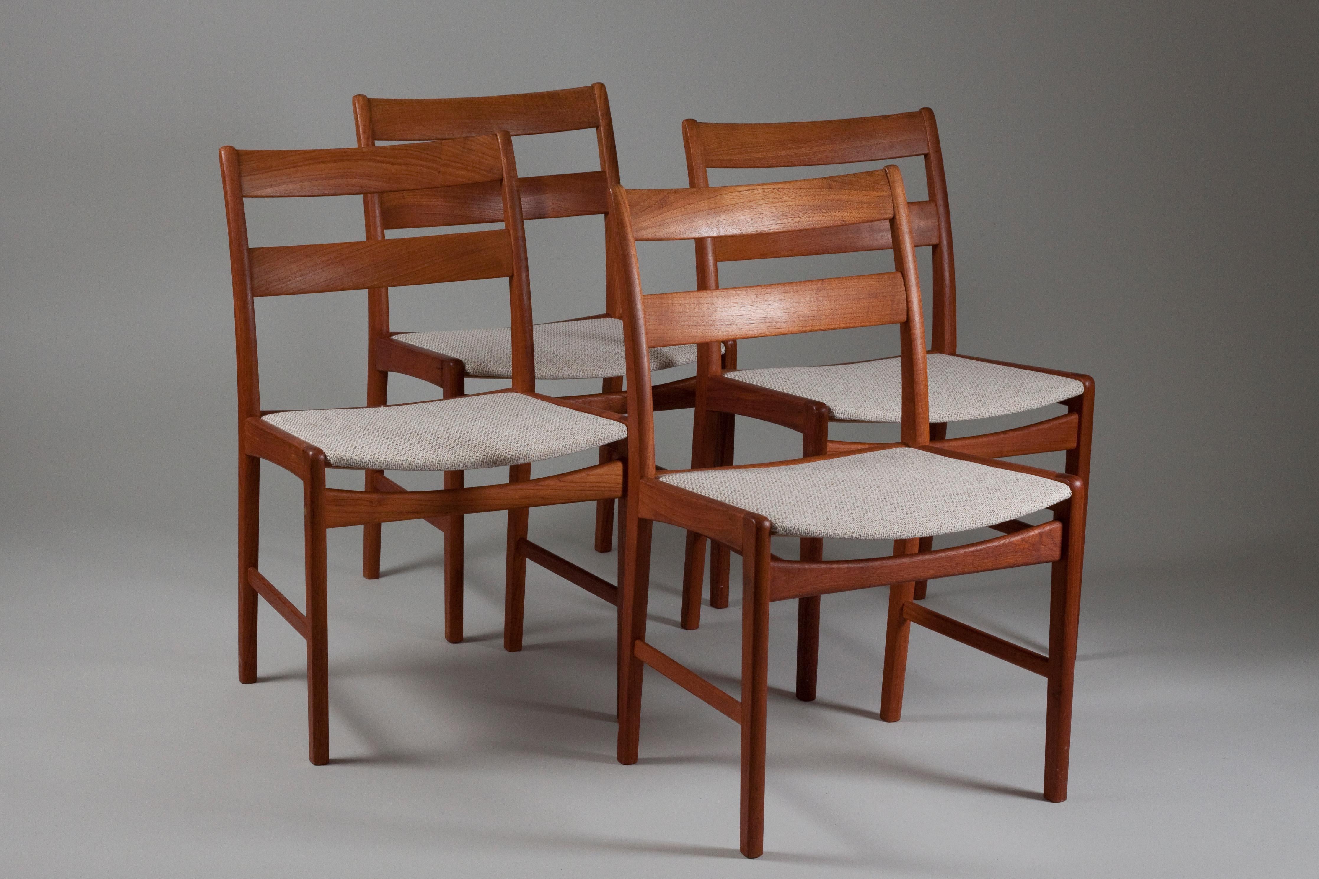 This set of four Danish teak Scandinavian modern dining chairs have been reupholstered and not been used after that. These stylish dining chairs are in good condition.